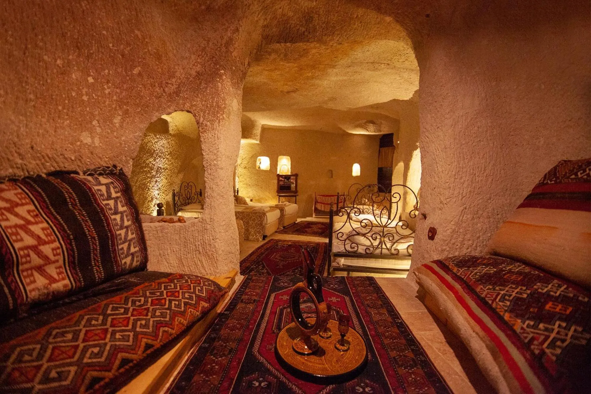 Photo of the whole room, Bed in Center Cave House
