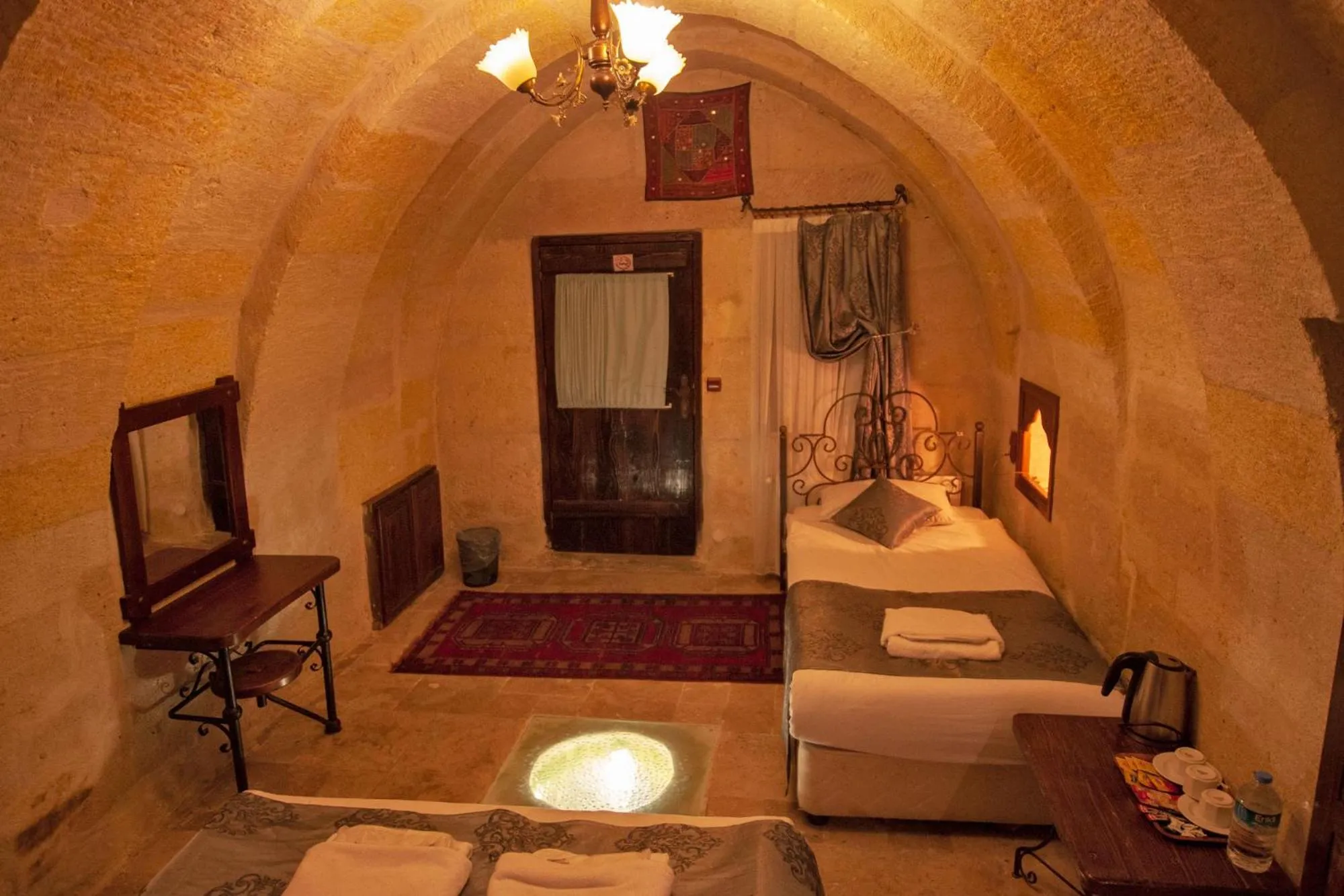 Photo of the whole room, Bed in Center Cave House