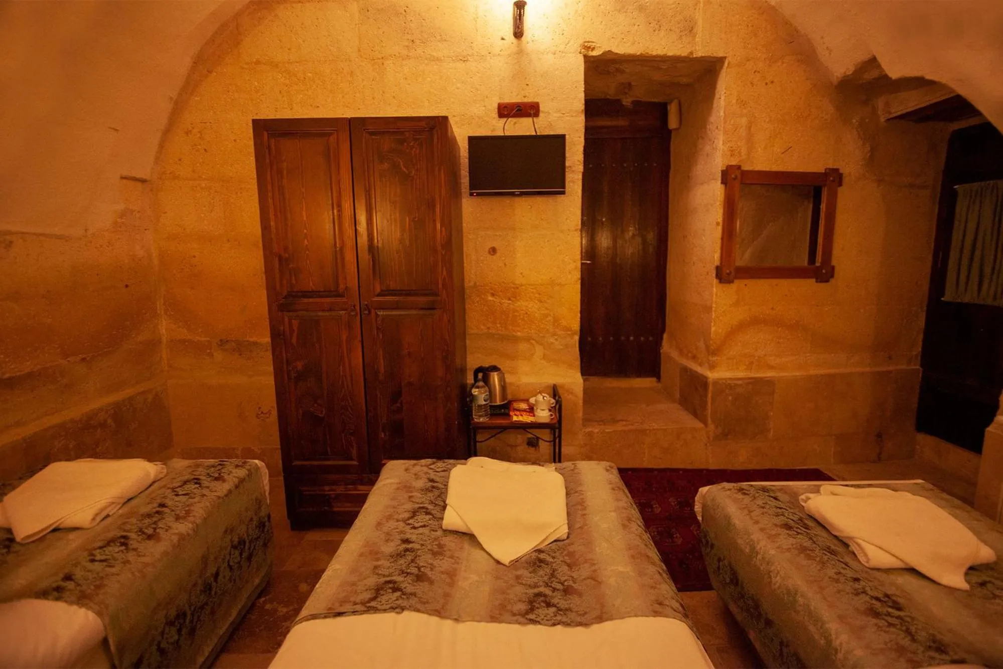 Bed in Center Cave House