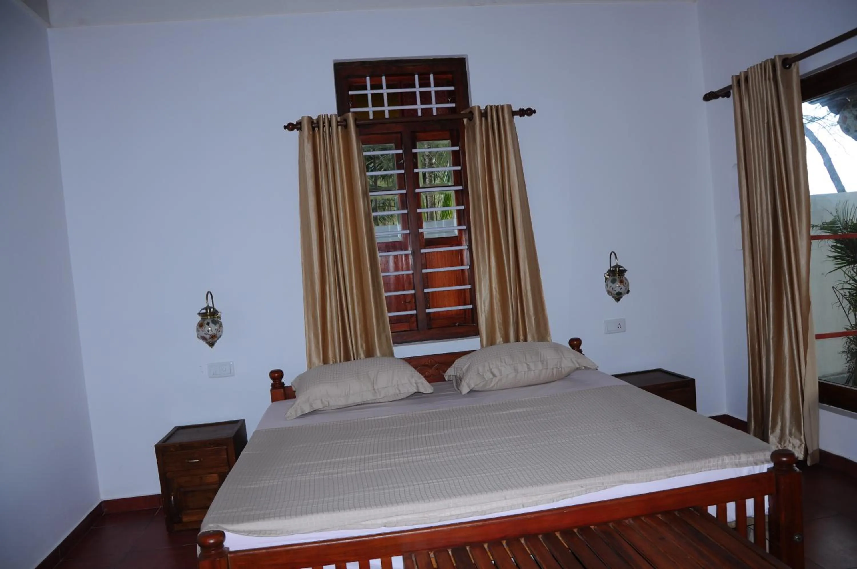 Photo of the whole room, Bed in Alleppey Beach Garden