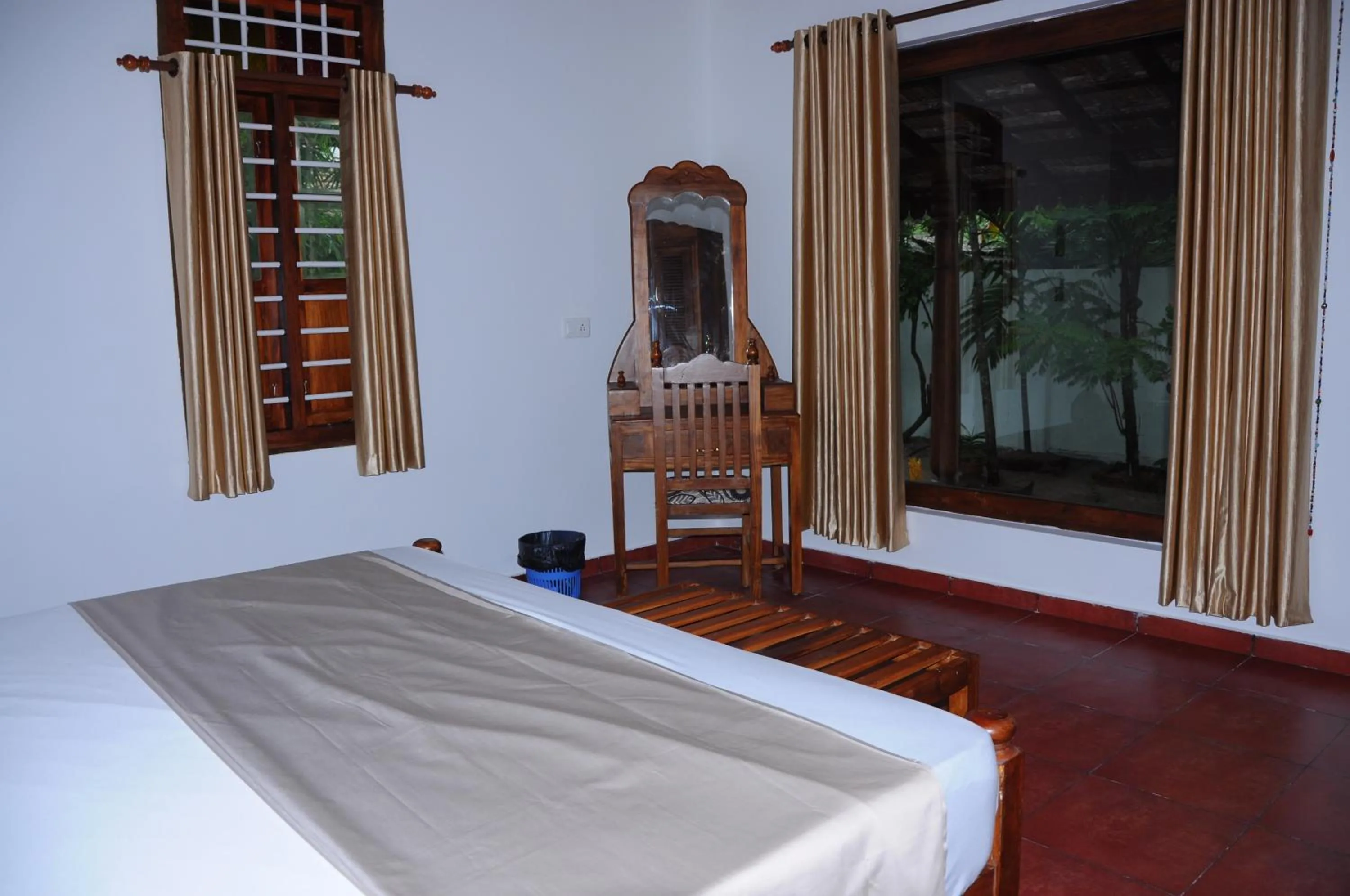Photo of the whole room, Bed in Alleppey Beach Garden