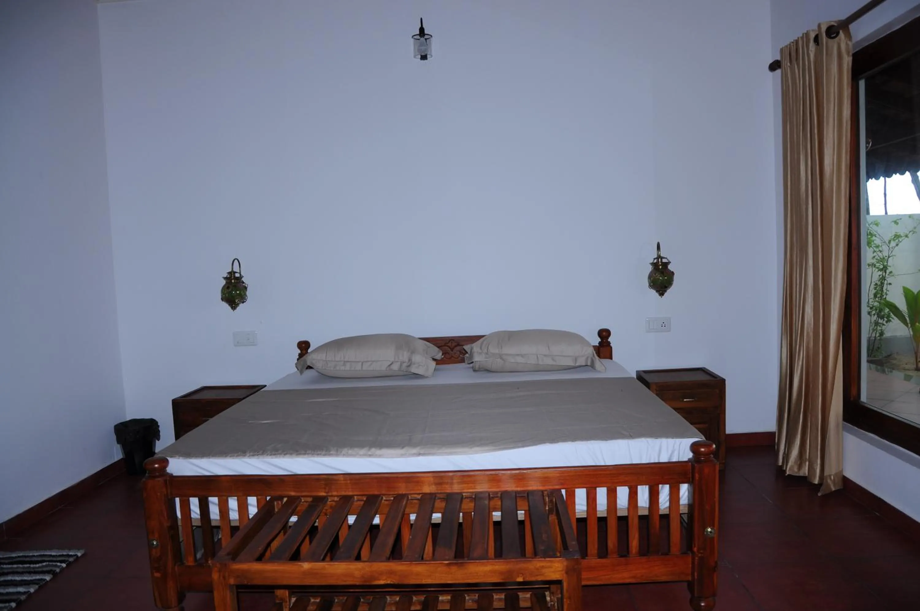 Photo of the whole room, Bed in Alleppey Beach Garden