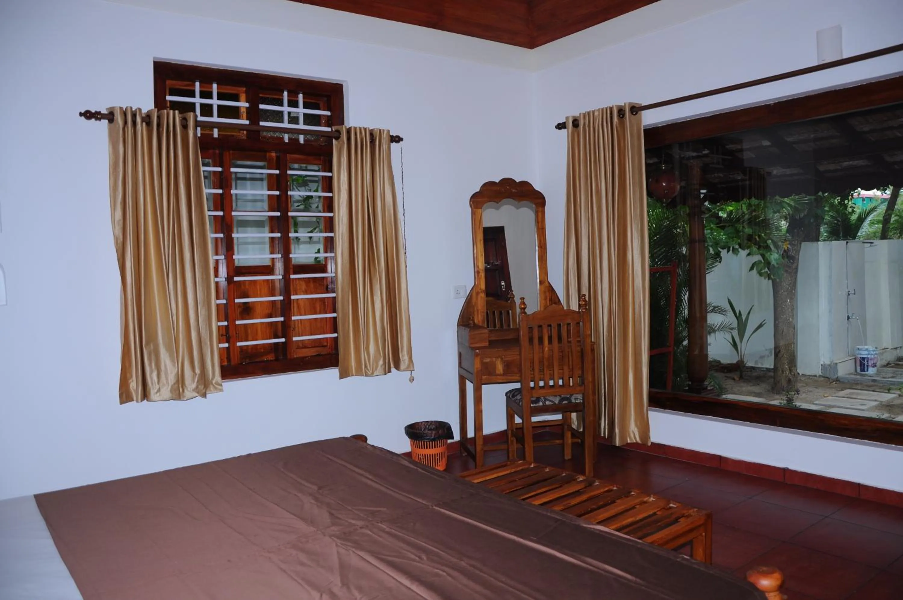 Photo of the whole room, Bed in Alleppey Beach Garden