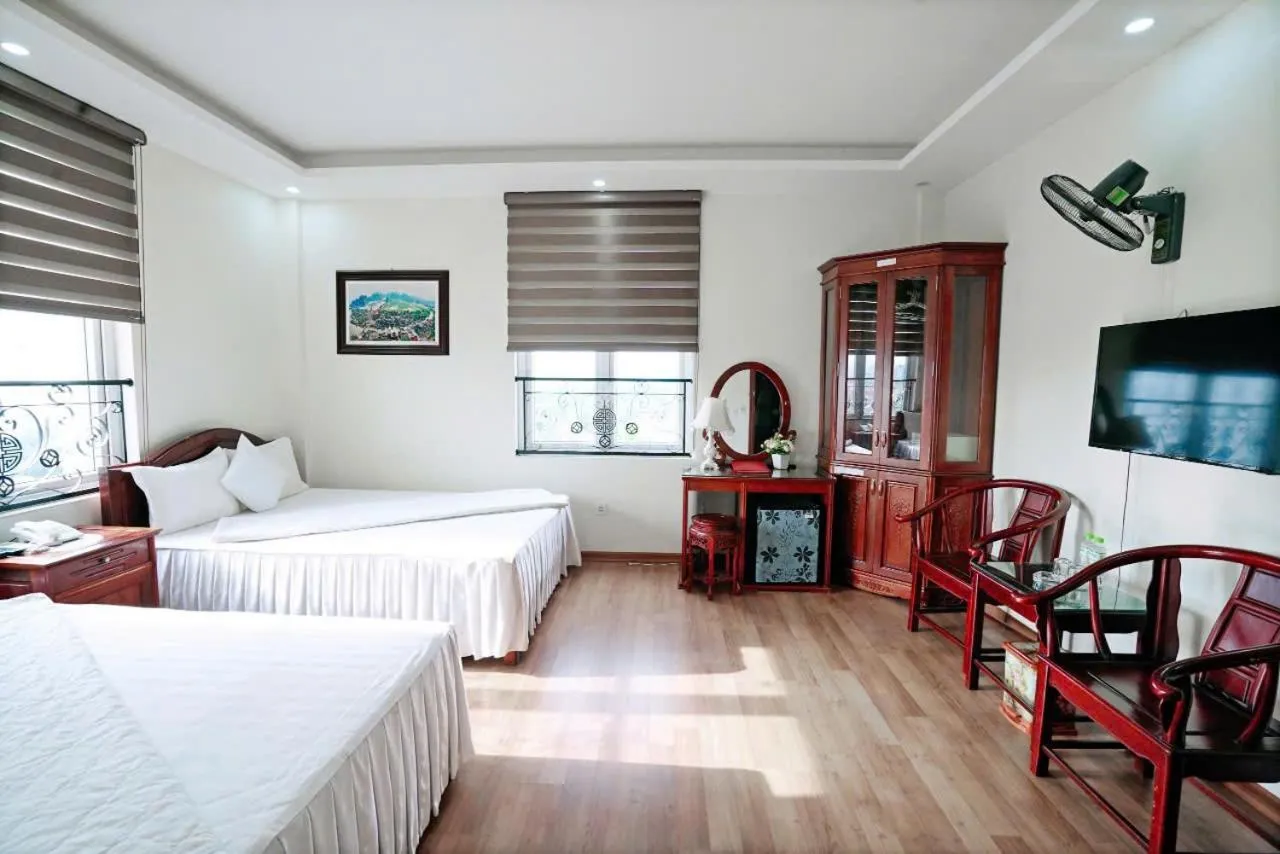 Deluxe Queen Room with Two Queen Beds in Thuan Thanh Hotel