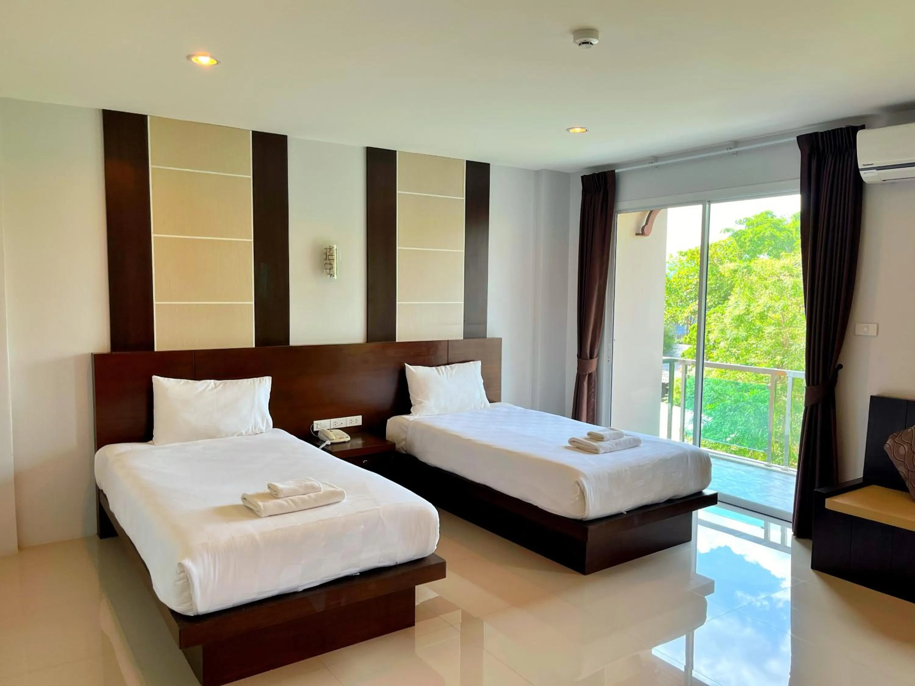 Bed in Peak Boutique City Hotel Krabi