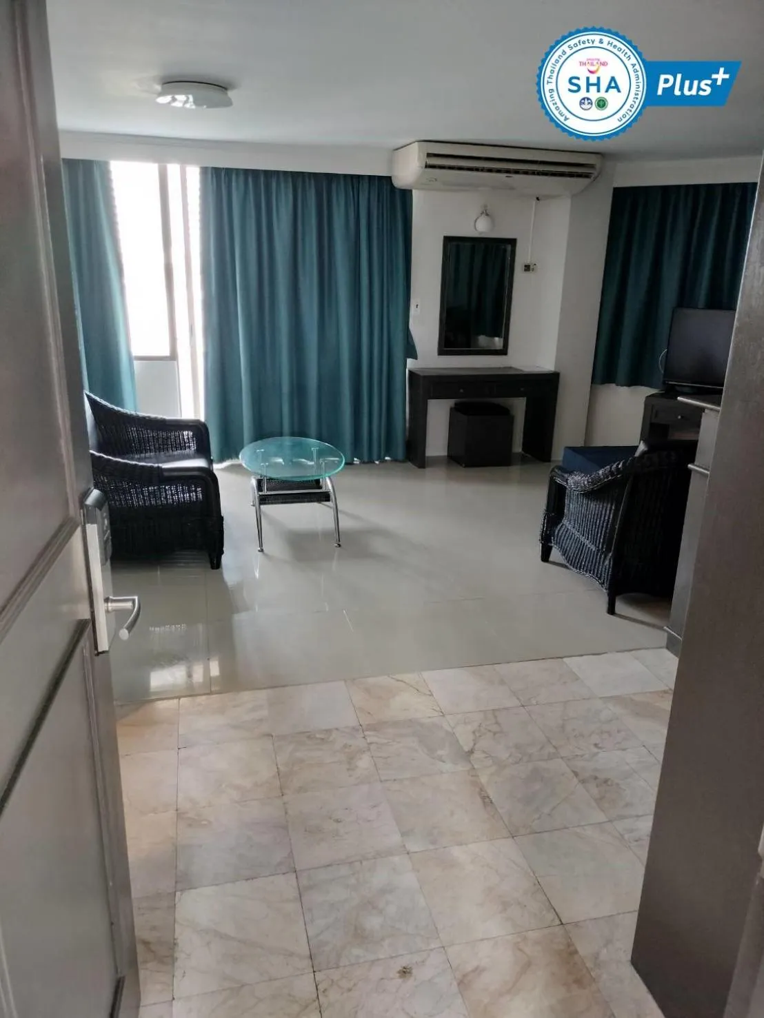 Seating area in Jomtien Longstay Hotel - SHA Plus Certified