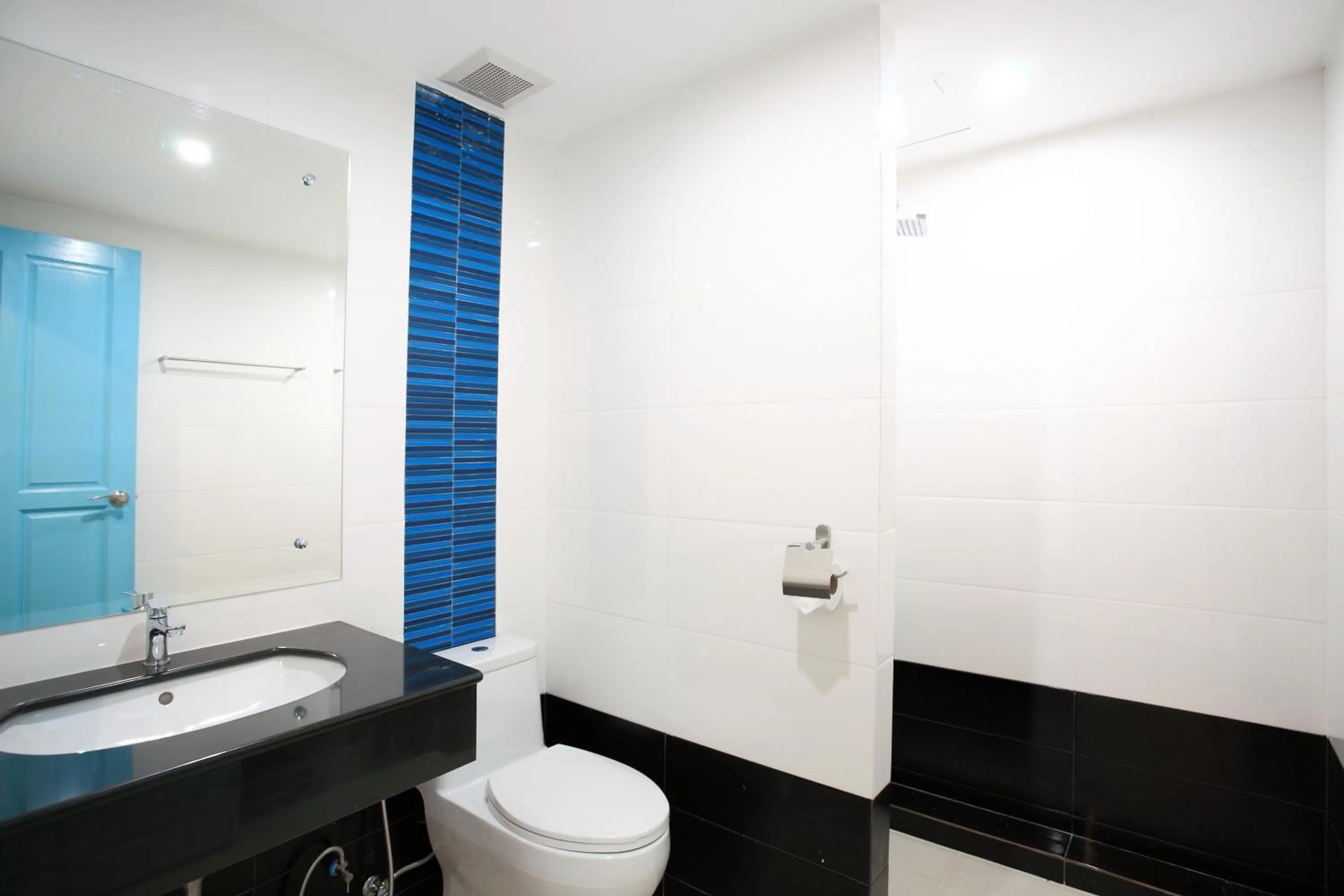 Toilet in The Malika Hotel - SHA Extra Plus