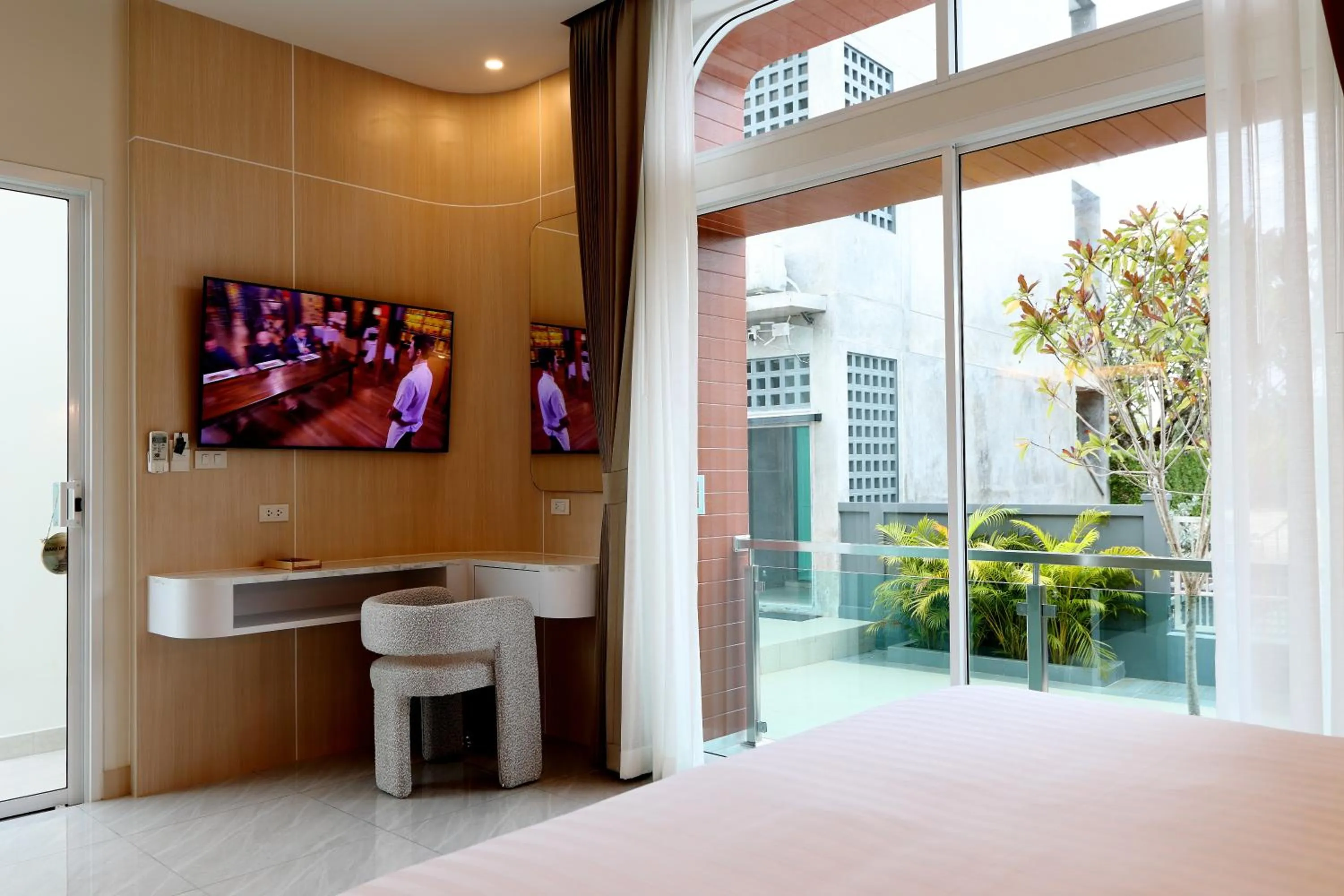 TV and multimedia in The Malika Hotel - SHA Extra Plus