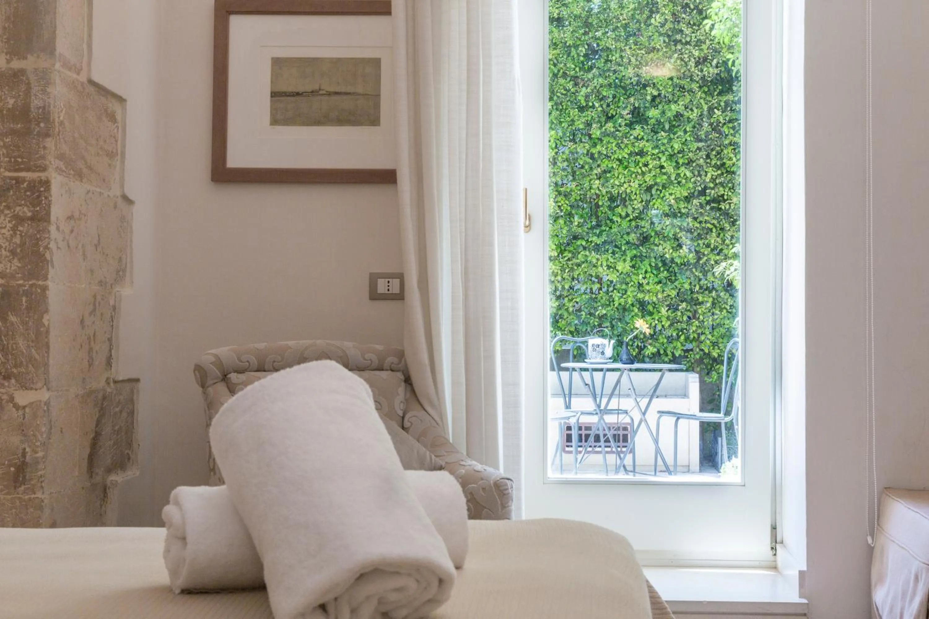 Garden view, Bed in Hotel Novecento