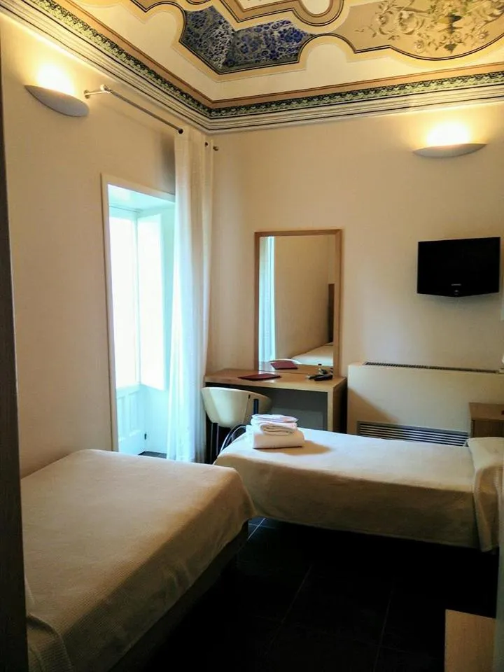 Bed in Hotel Novecento