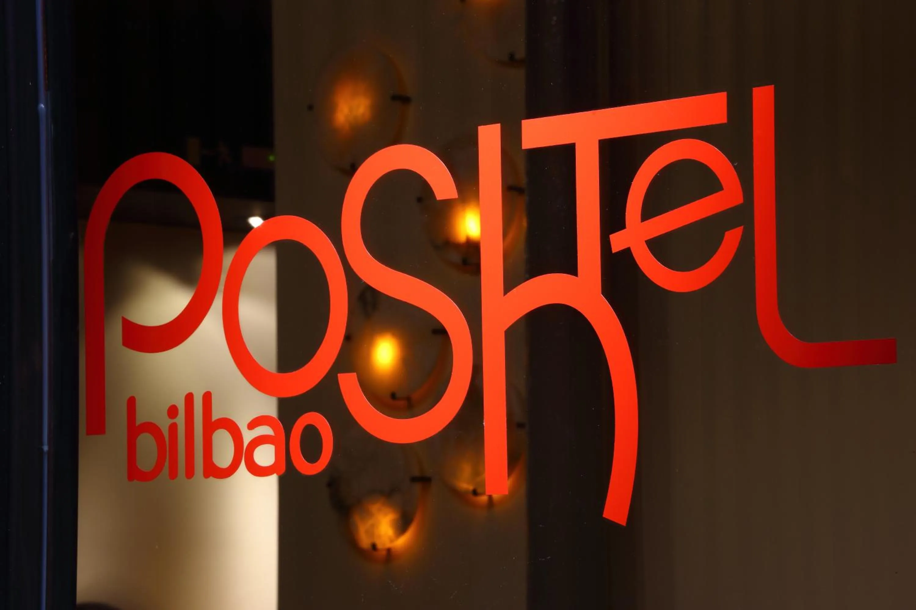 Property logo or sign in Poshtel Bilbao - Premium Hostel