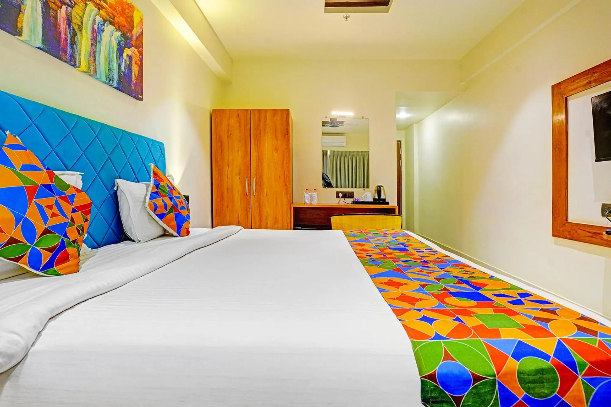 Bed in FabHotel Siddharth Inn - Nr Siddharth Bunglows