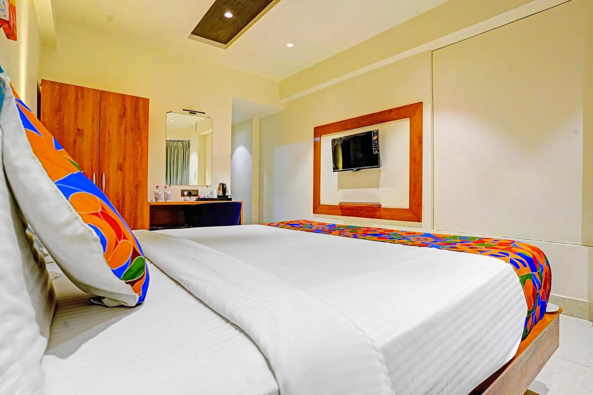 Bed in FabHotel Siddharth Inn - Nr Siddharth Bunglows