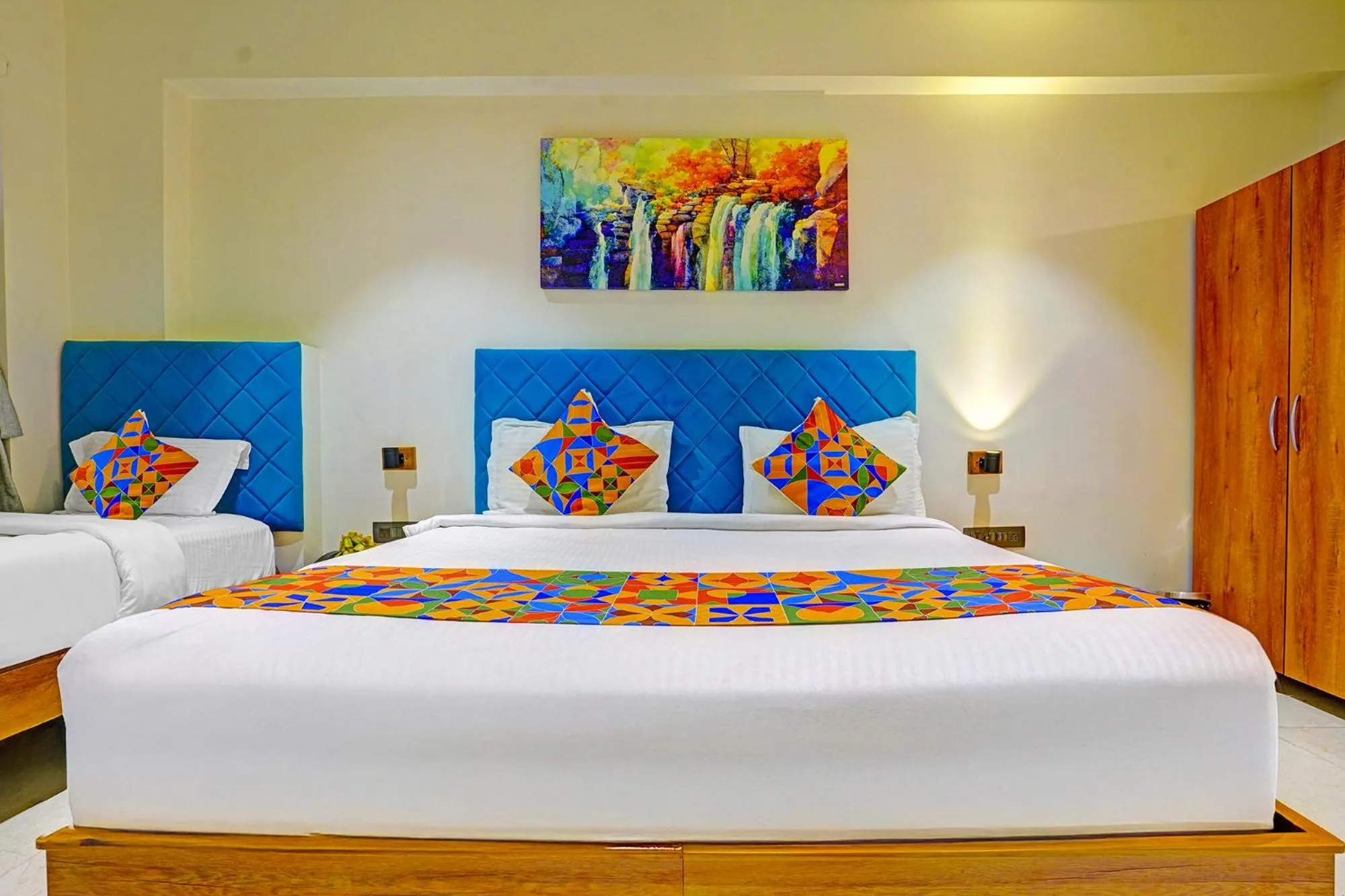 Bed in FabHotel Siddharth Inn - Nr Siddharth Bunglows