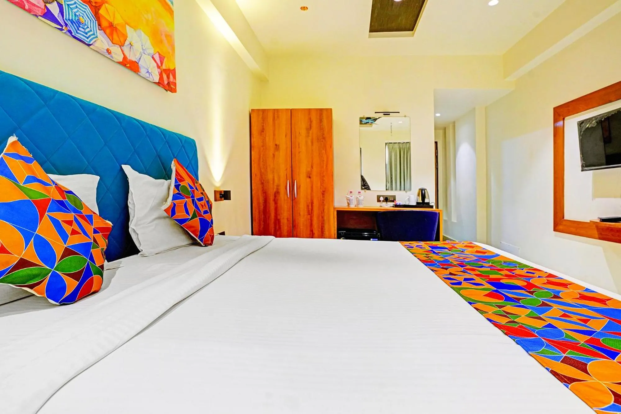 Bed in FabHotel Siddharth Inn - Nr Siddharth Bunglows