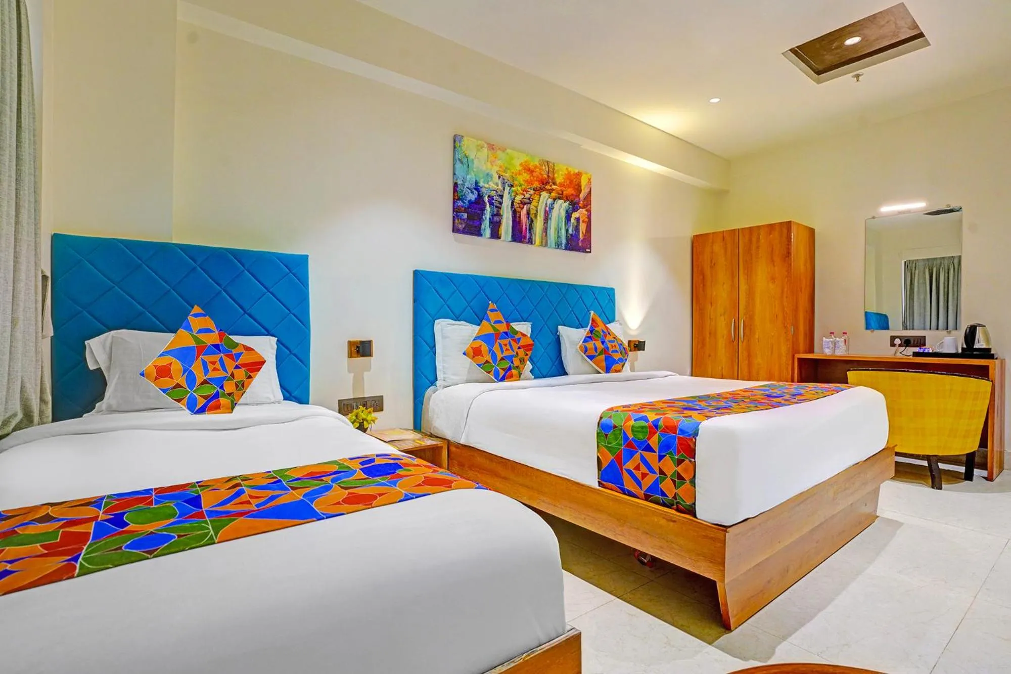 Bed in FabHotel Siddharth Inn - Nr Siddharth Bunglows