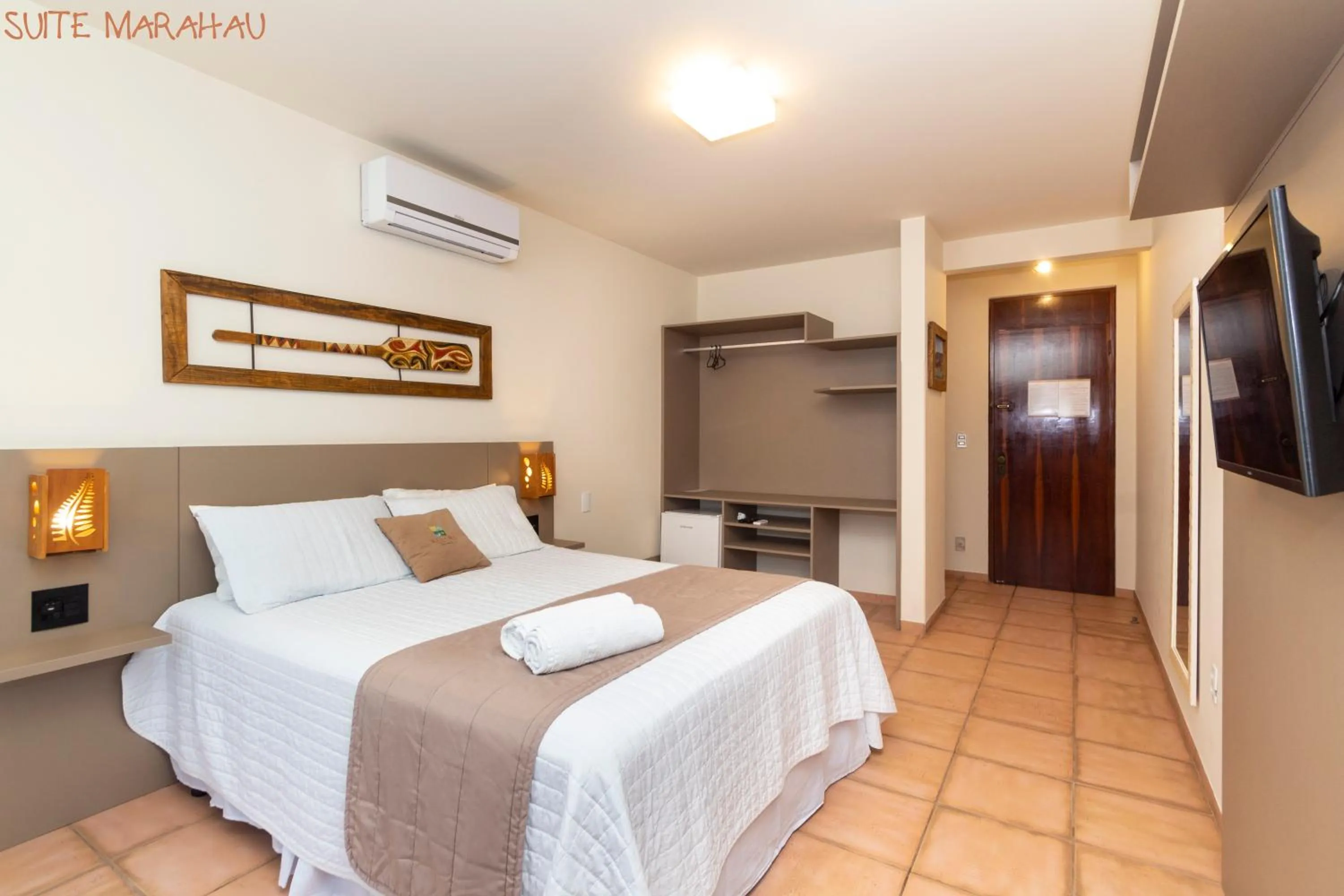 Bed in Pousada Kia Ora Bombinhas