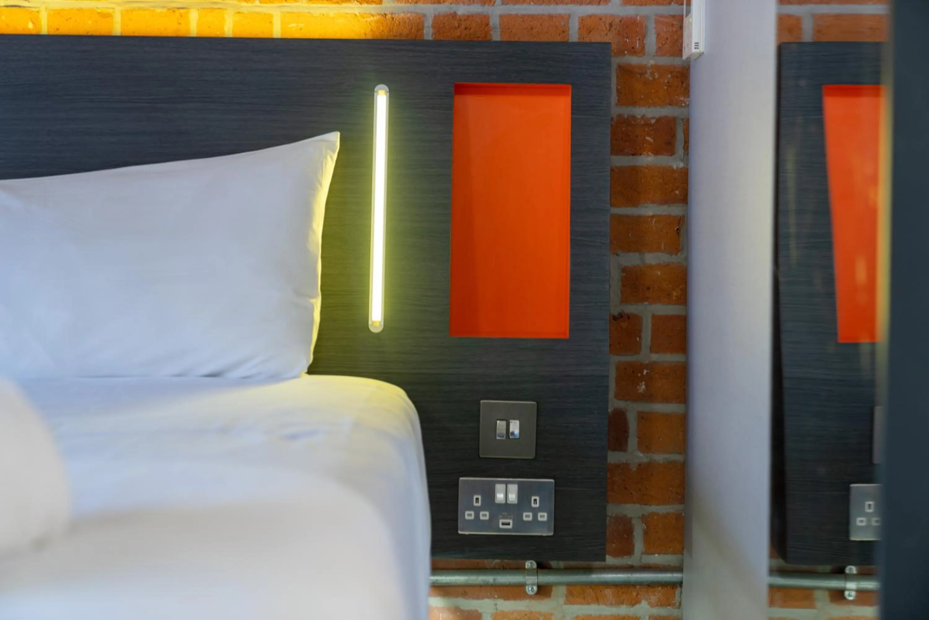 Bedroom, Bed in easyHotel Manchester