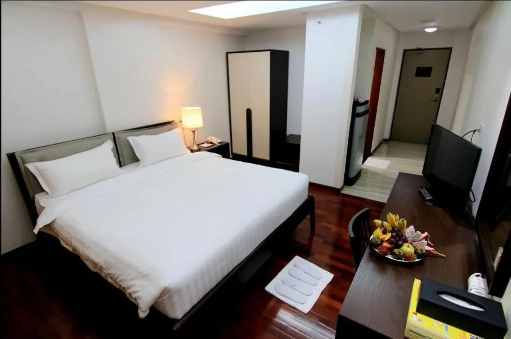 Bed in Myanmar Life Hotel