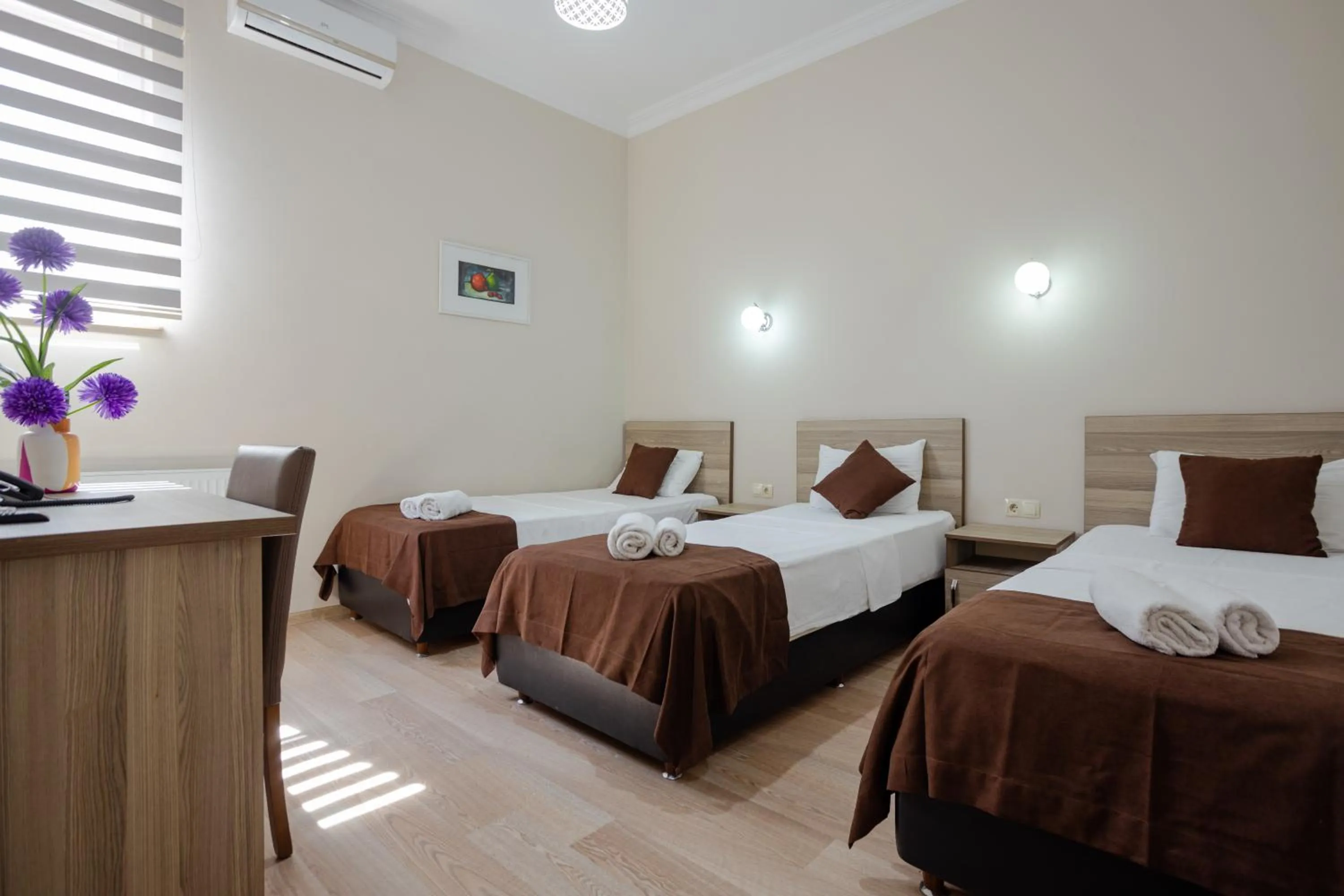 Bed in Daisi Sunset Hotel