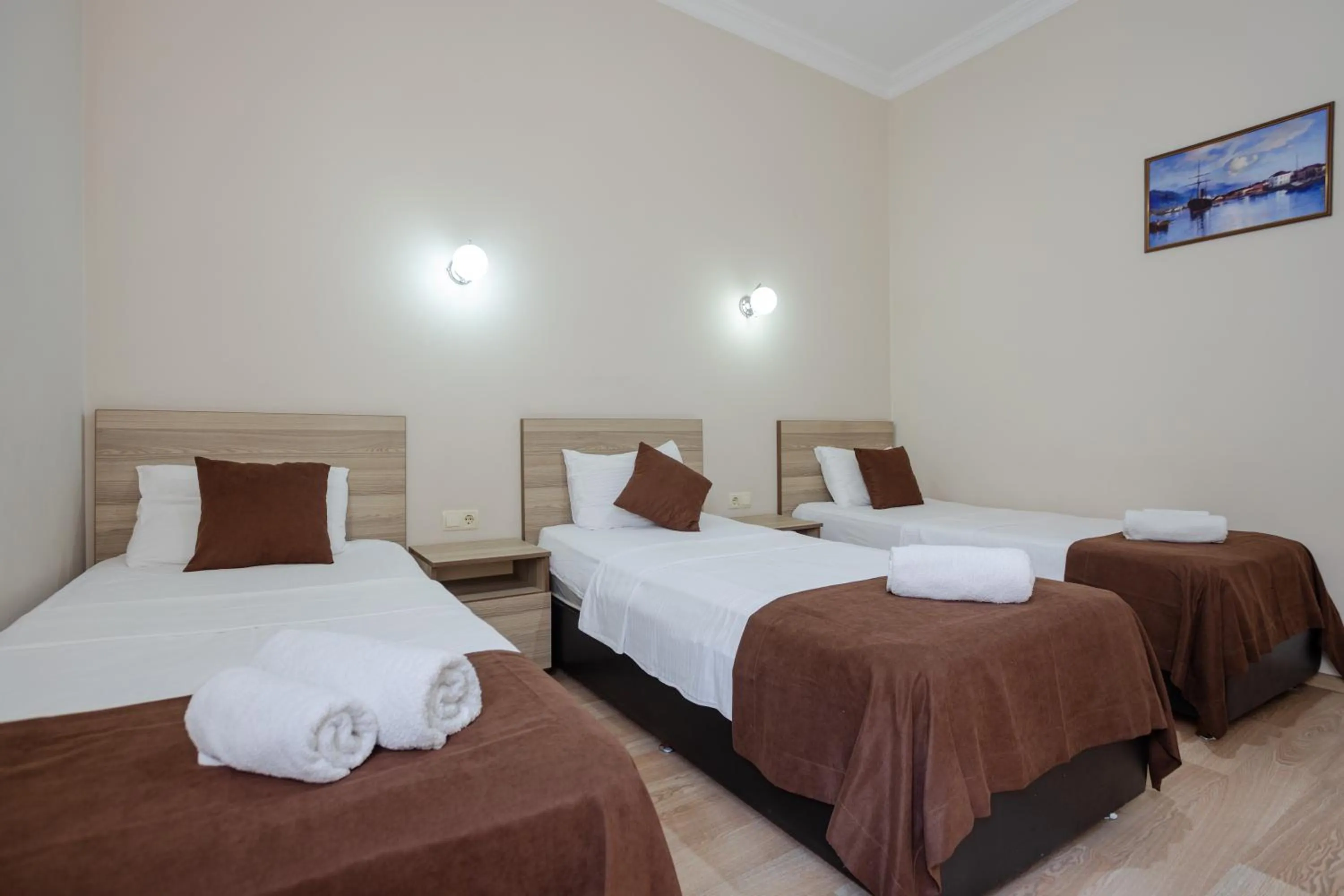 Bed in Daisi Sunset Hotel