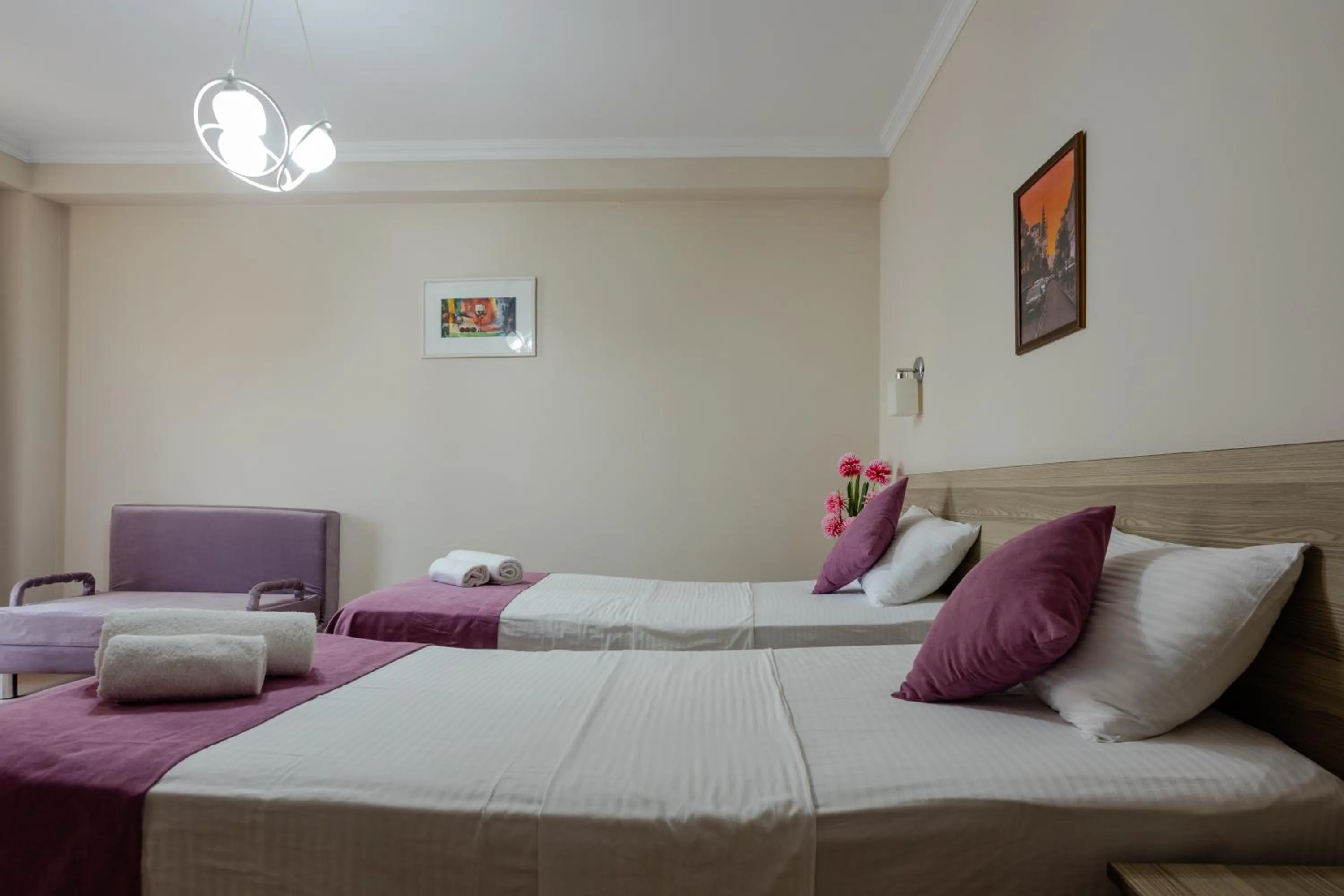 Bed in Daisi Sunset Hotel