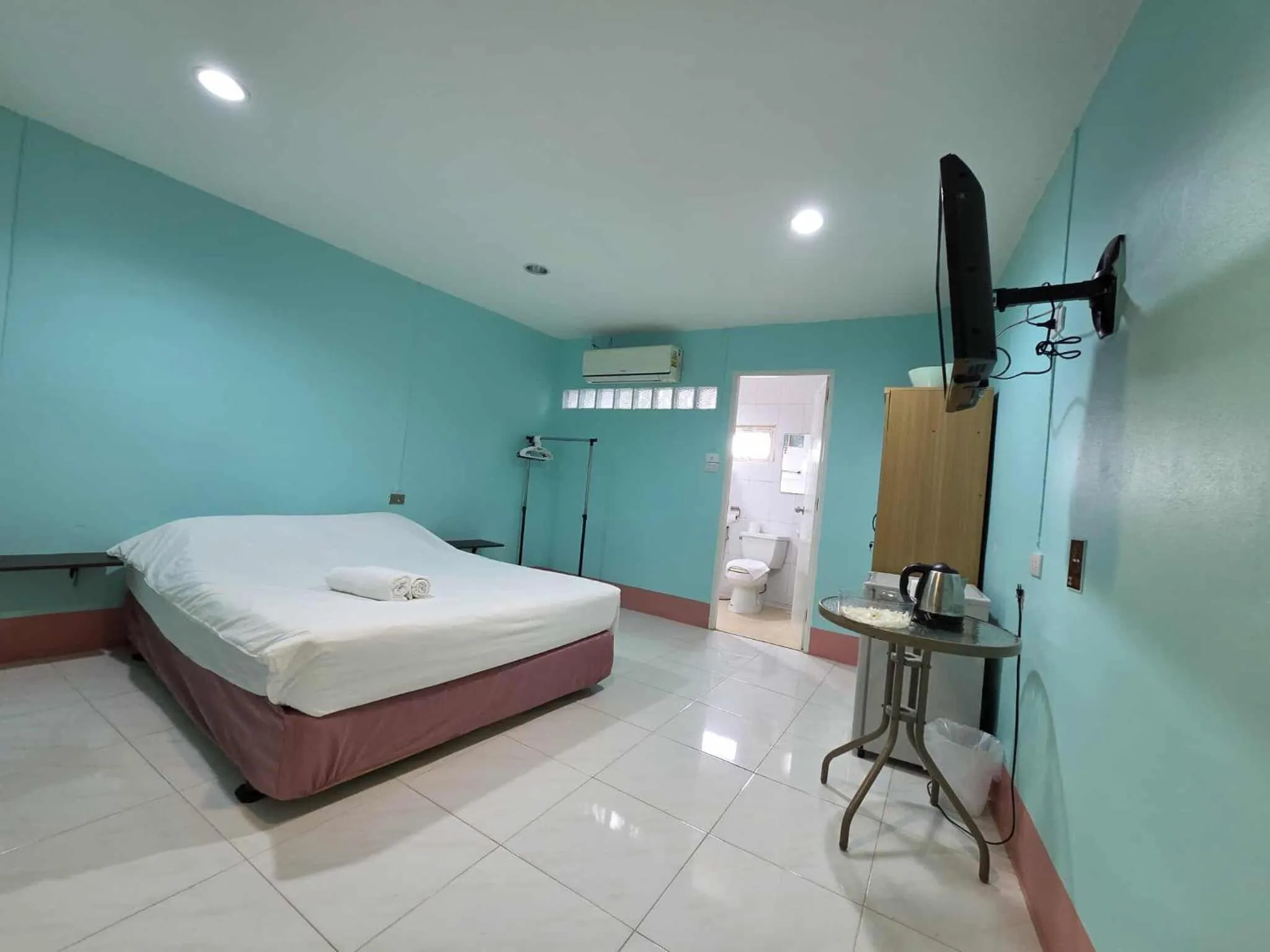 Photo of the whole room, Bed in City Inn Udonthani