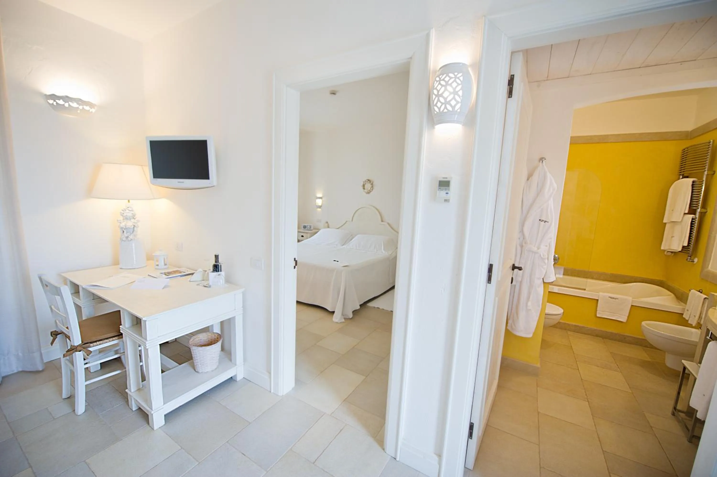 Seating area, Bed in Borgobianco Resort & Spa Polignano - MGallery Collection