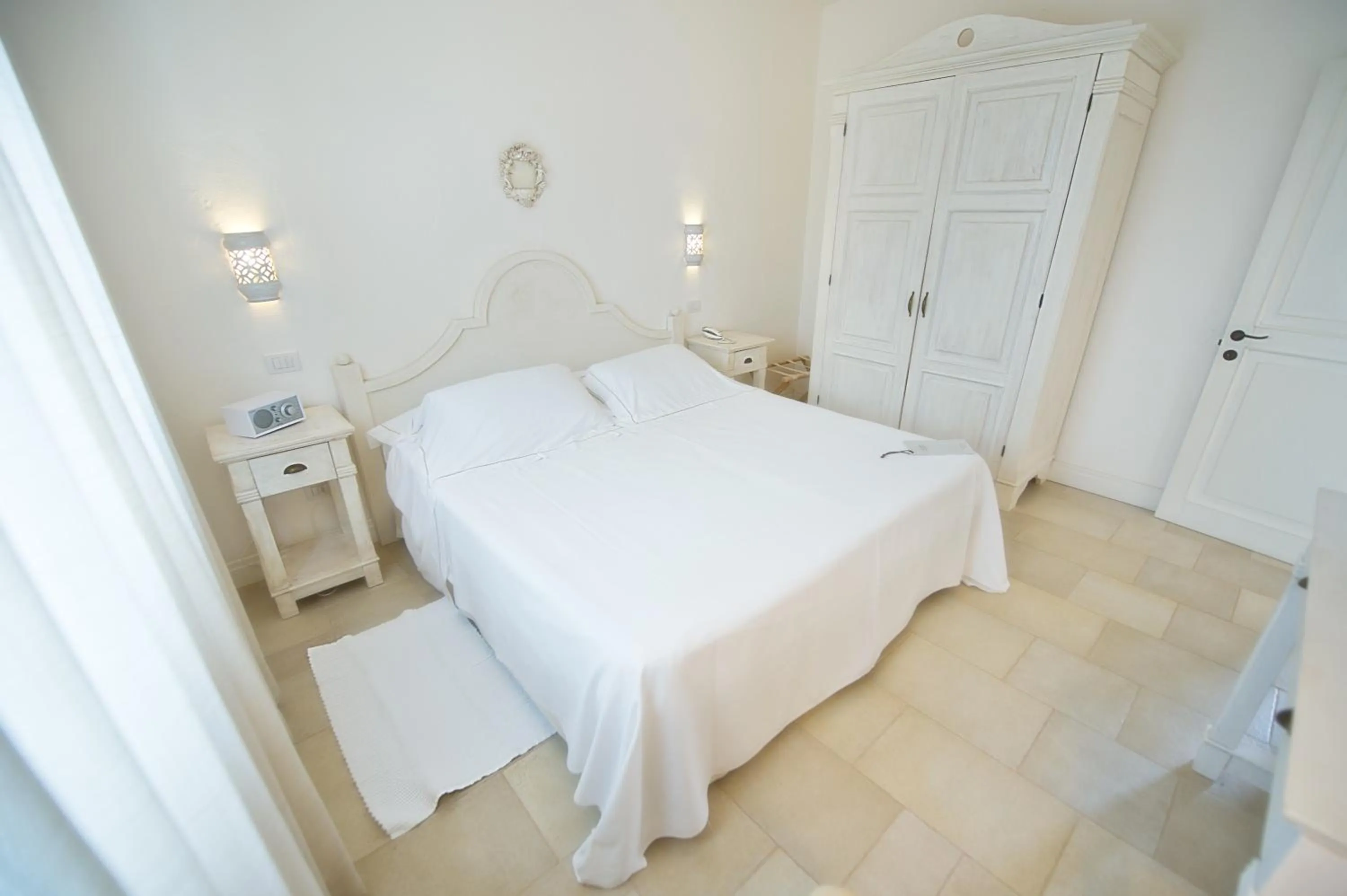 Bed in Borgobianco Resort & Spa Polignano - MGallery Collection