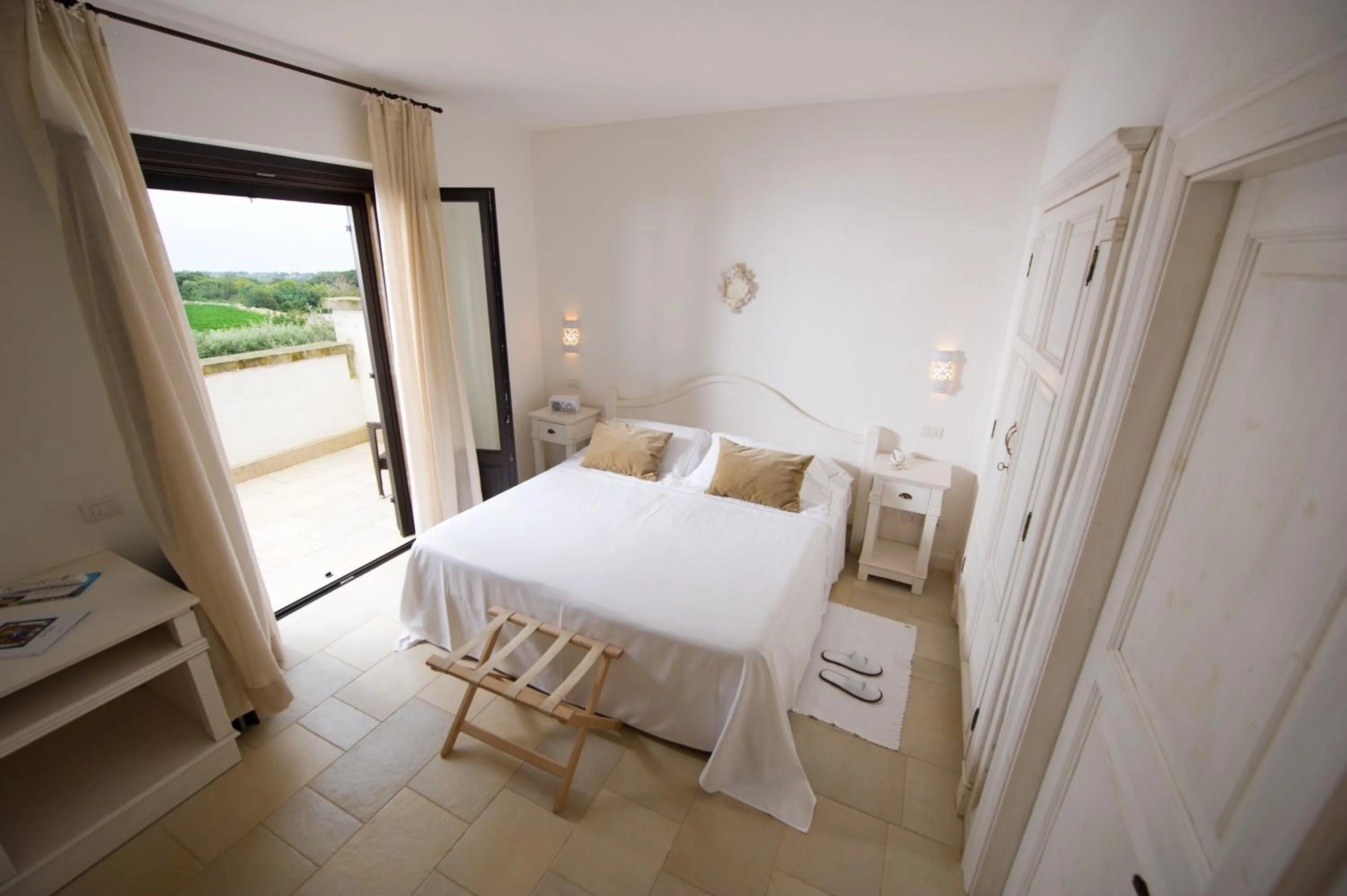 Photo of the whole room, Bed in Borgobianco Resort & Spa Polignano - MGallery Collection