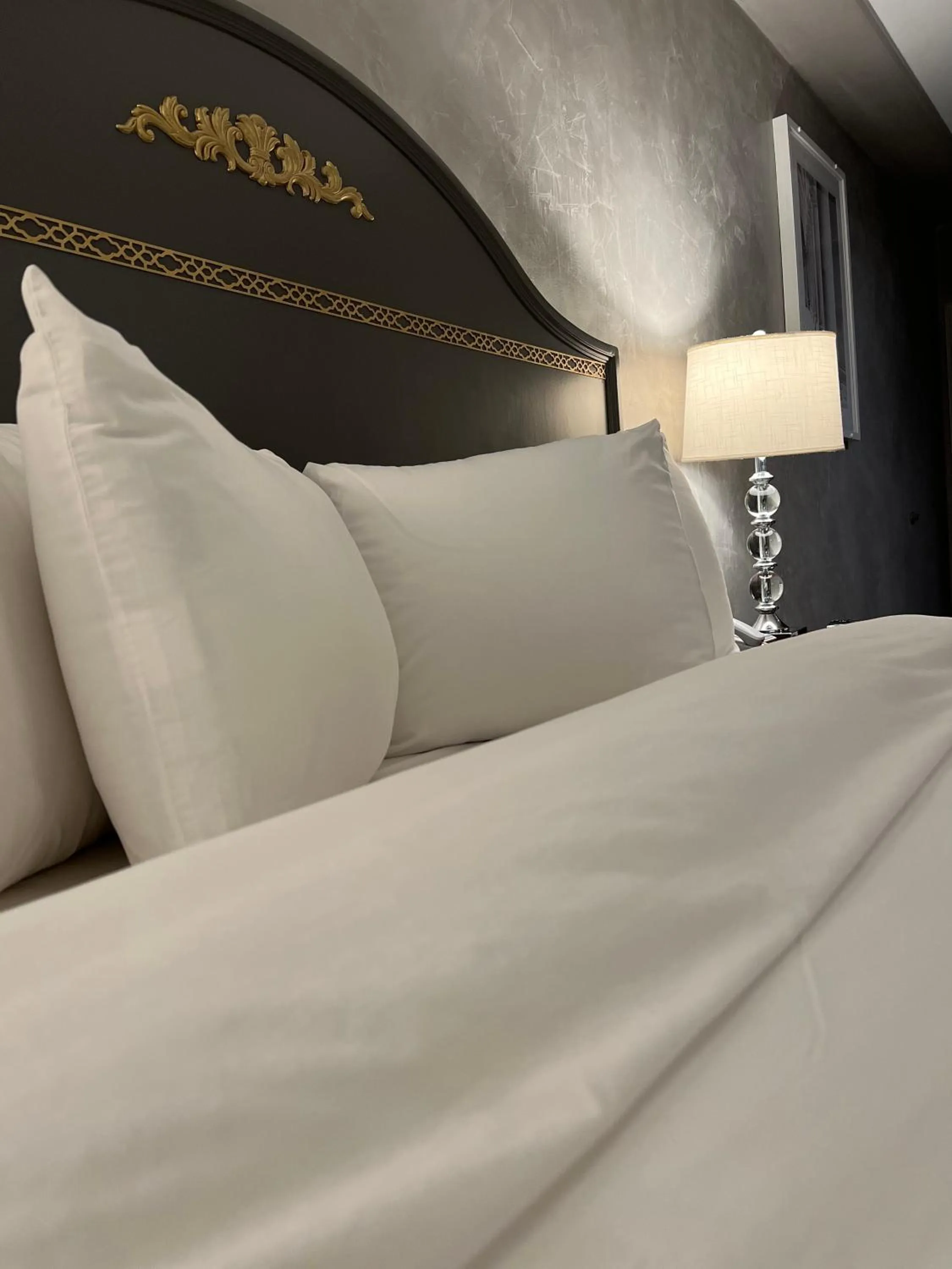 Bed in Chateau Suites