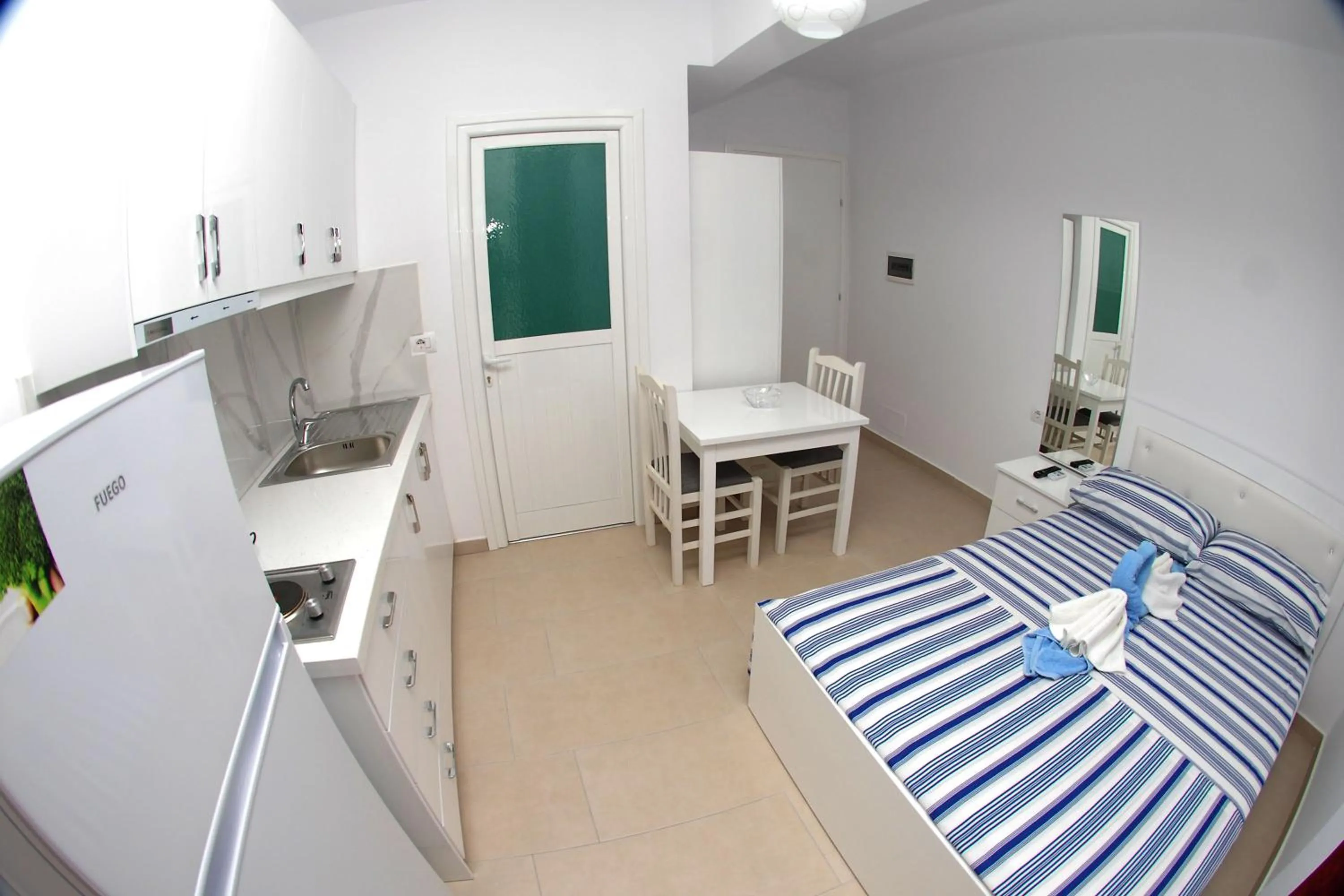 Dining area, Bed in Vila Renato Ksamil