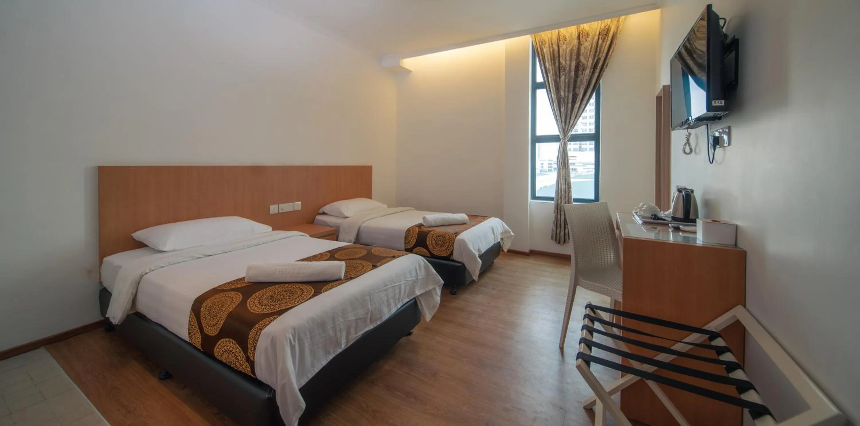 Photo of the whole room, Bed in 1 Million Hotel