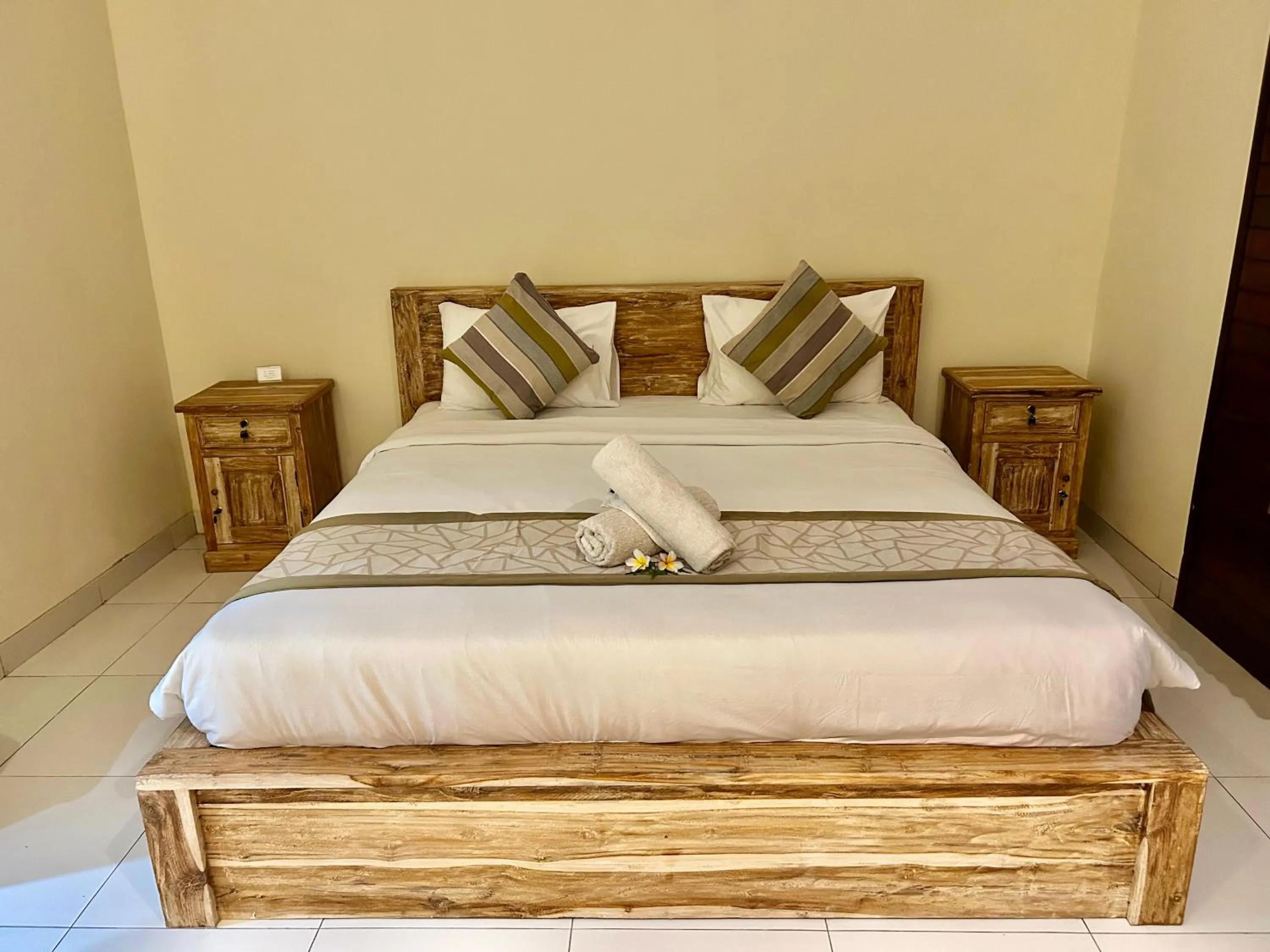 Bed in Nusa Garden Homestay