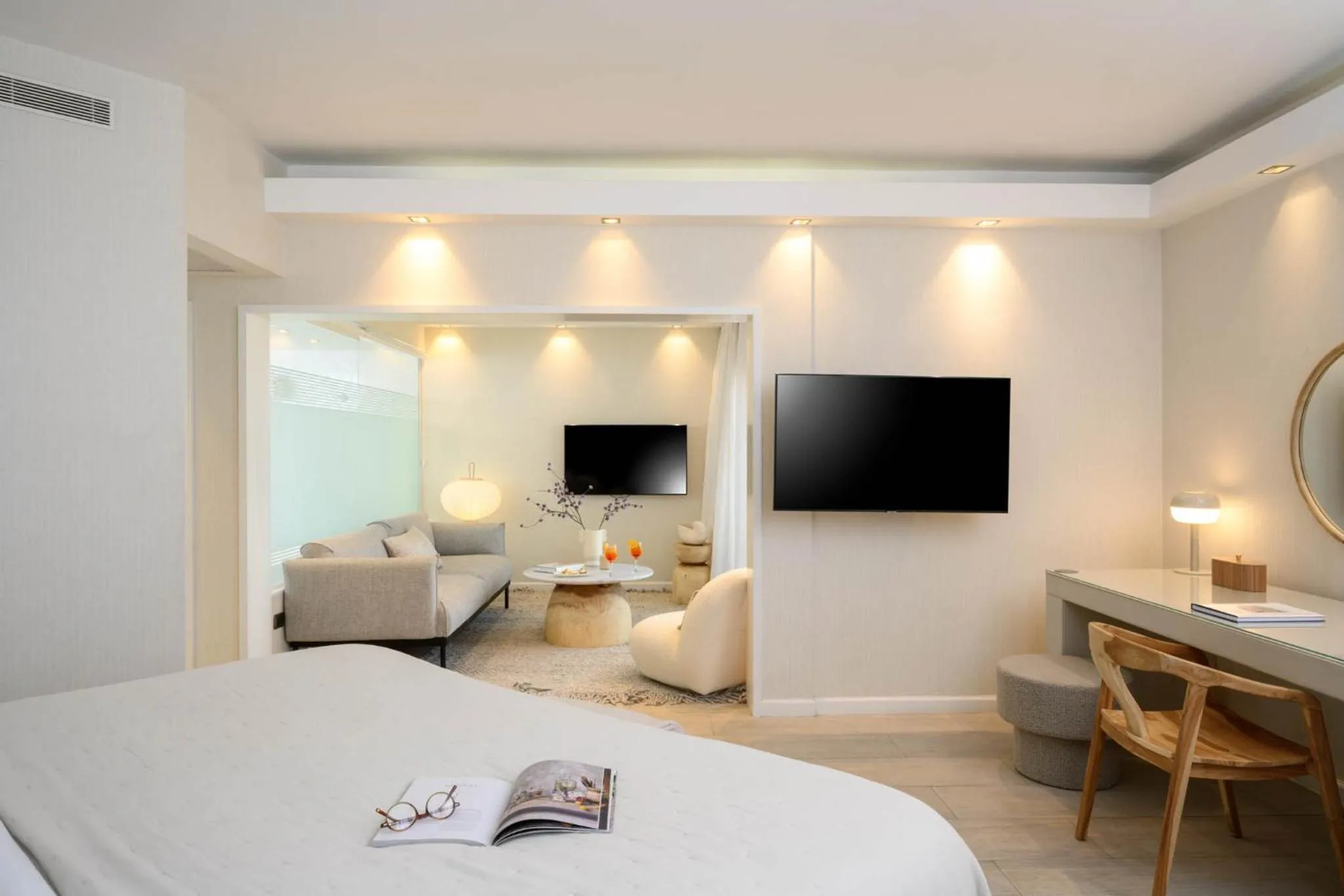 Living room, Bed in Carlton Tel Aviv Hotel – Luxury on the Beach