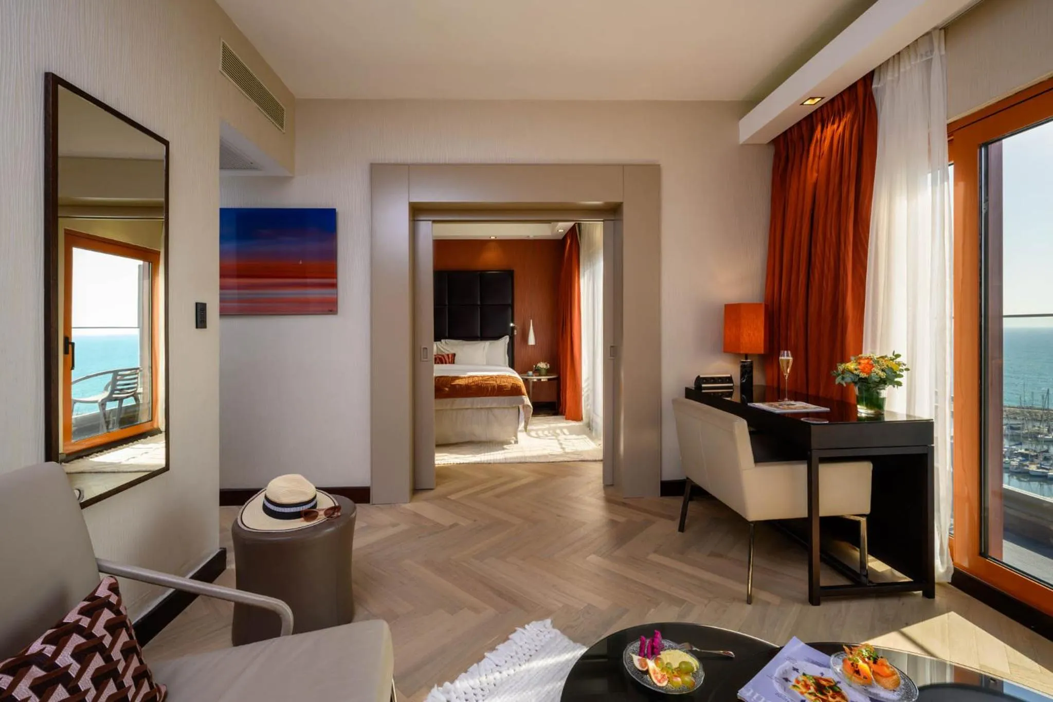 Living room, Bed in Carlton Tel Aviv Hotel – Luxury on the Beach