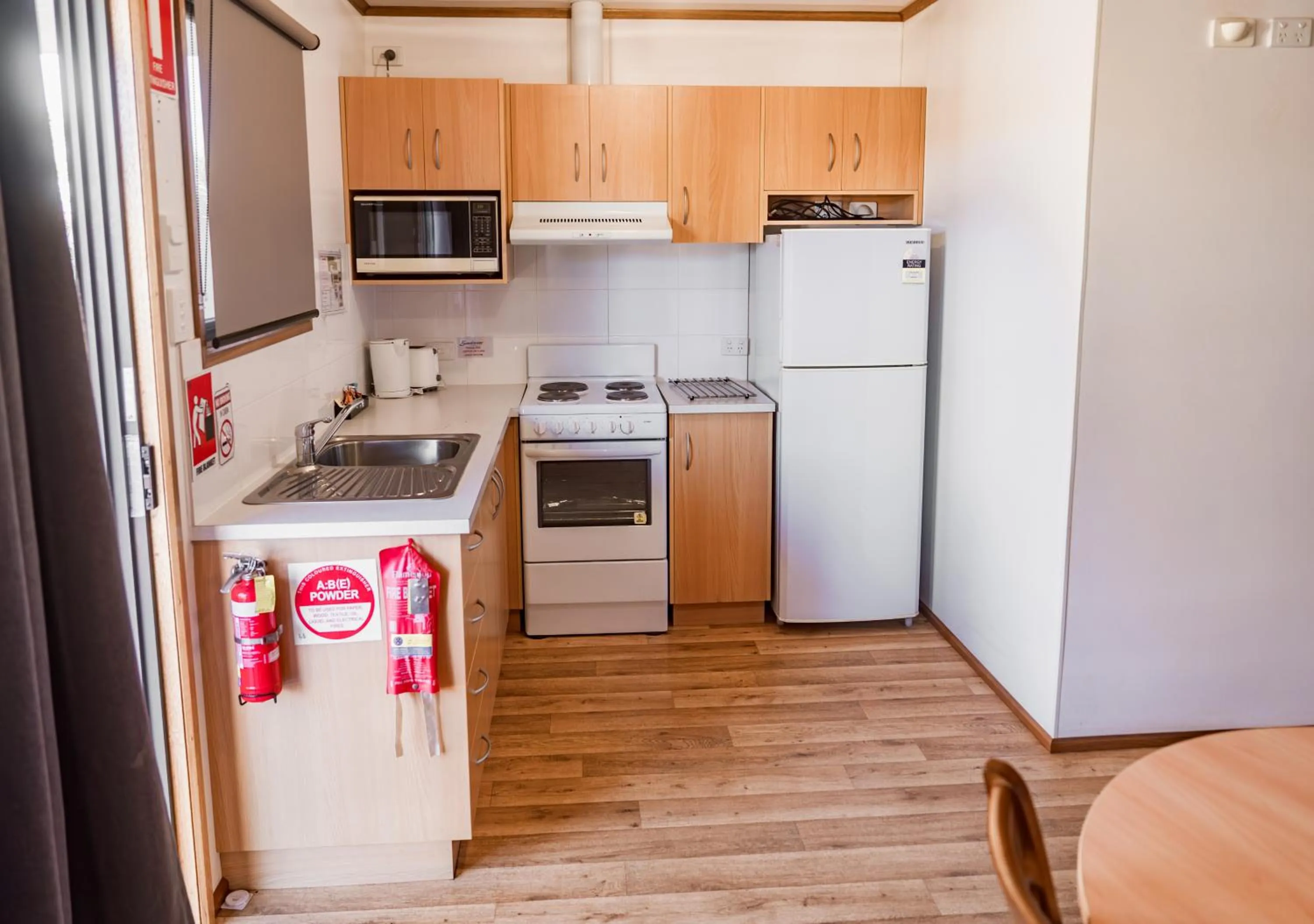 kitchen in The Sundowner Cabin & Tourist Park