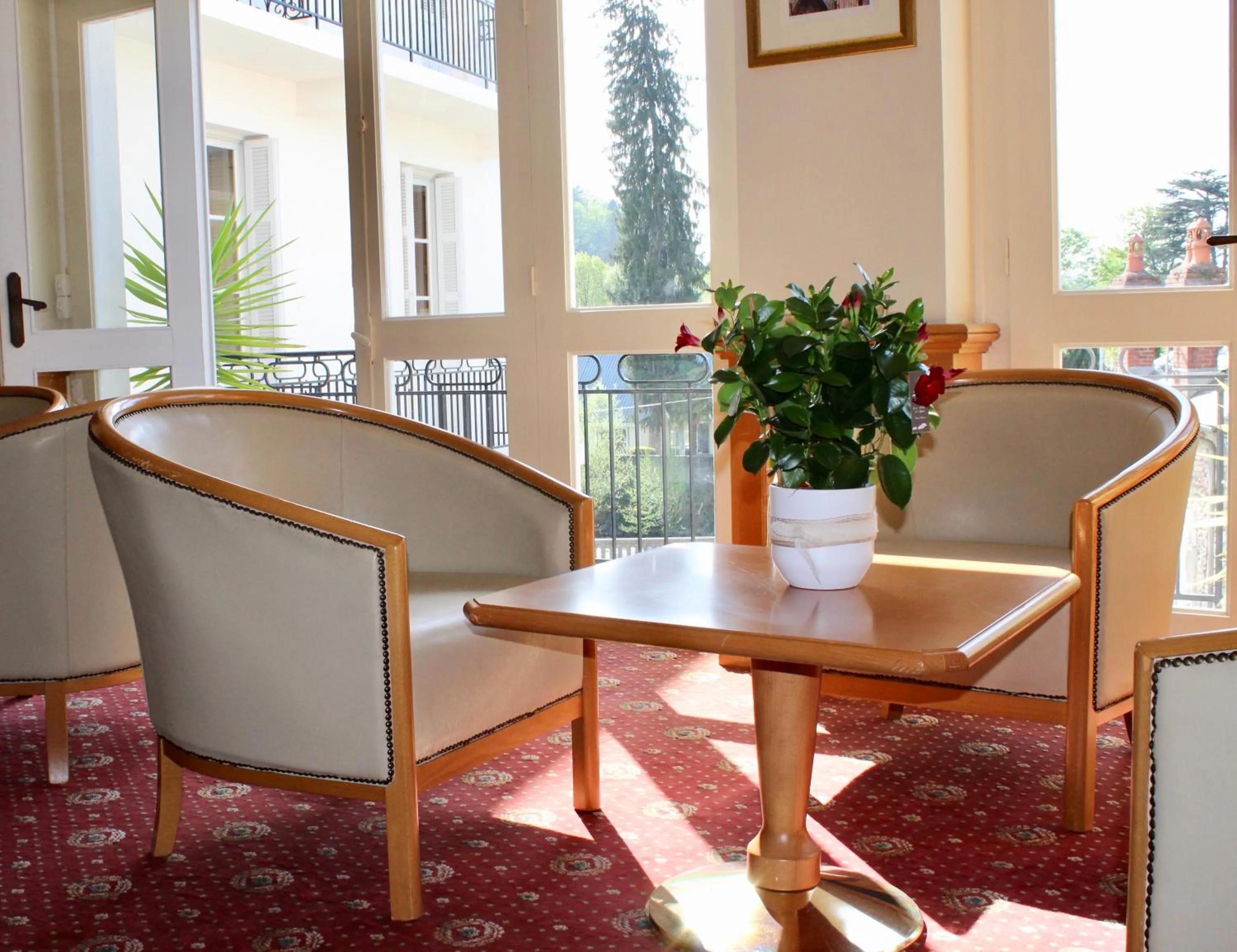 Communal lounge/ TV room in Hôtel Sainte Marie