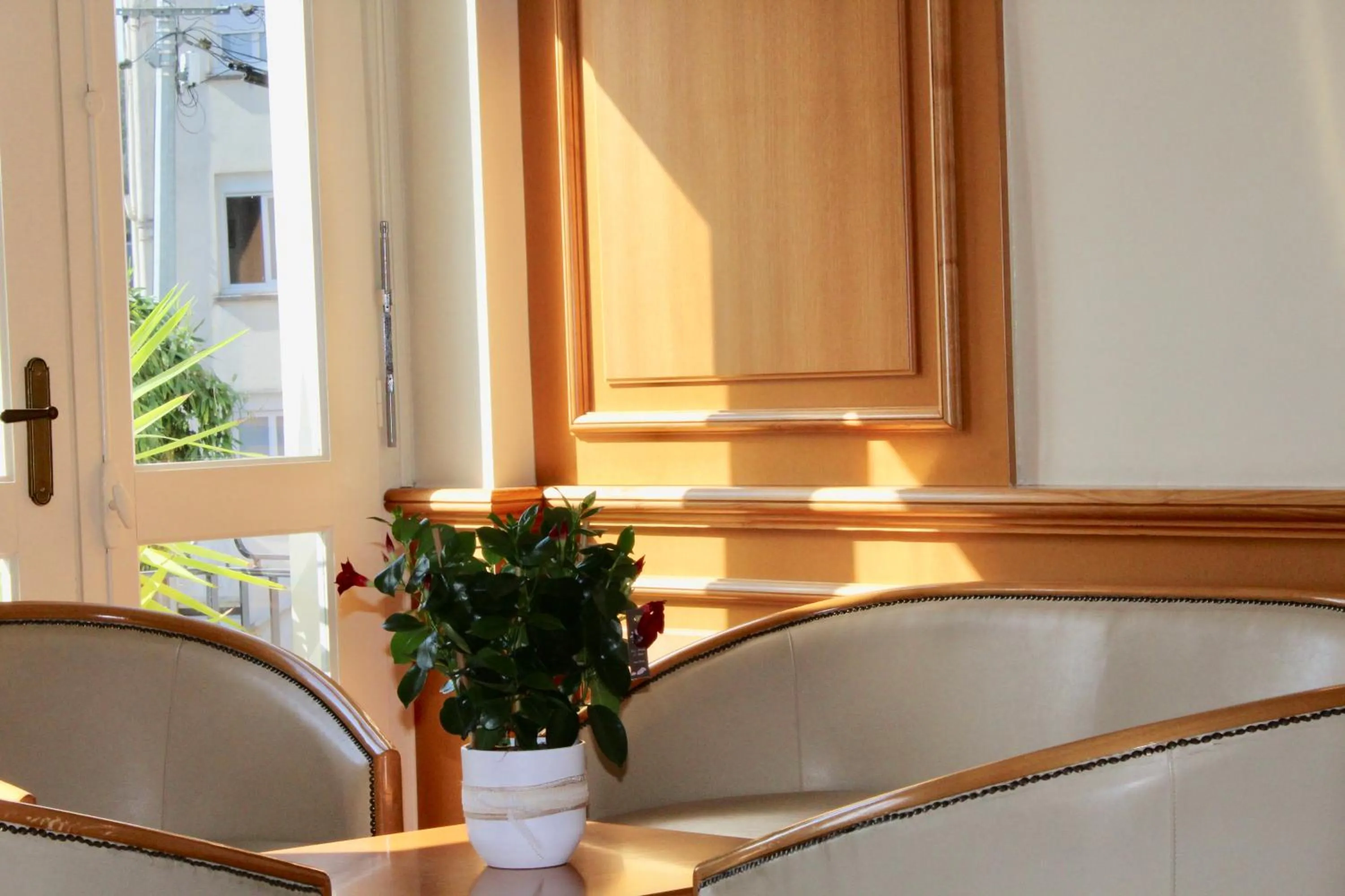 Communal lounge/ TV room in Hôtel Sainte Marie