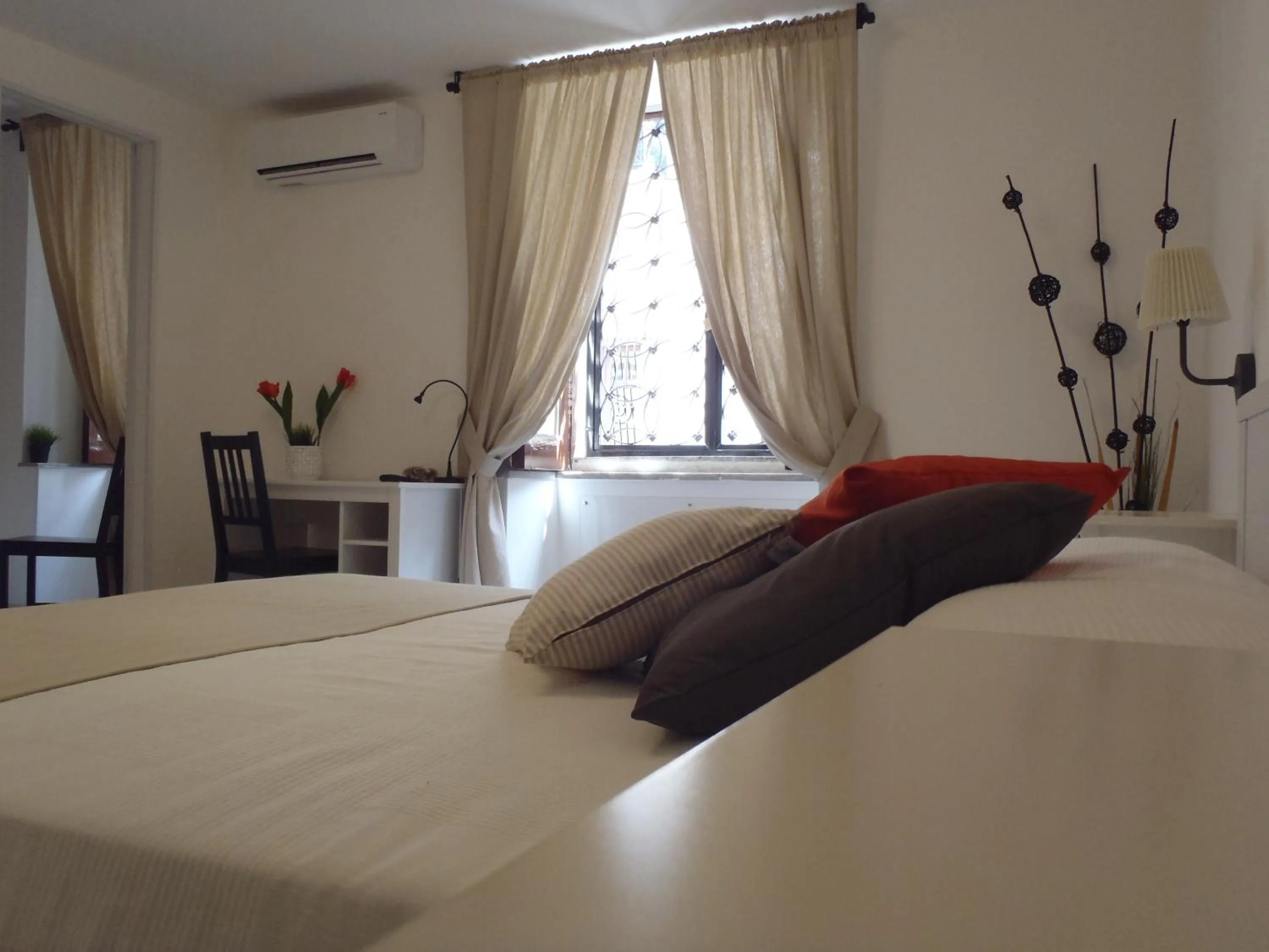 Bed in Il Cortiletto Di Piazza Verga