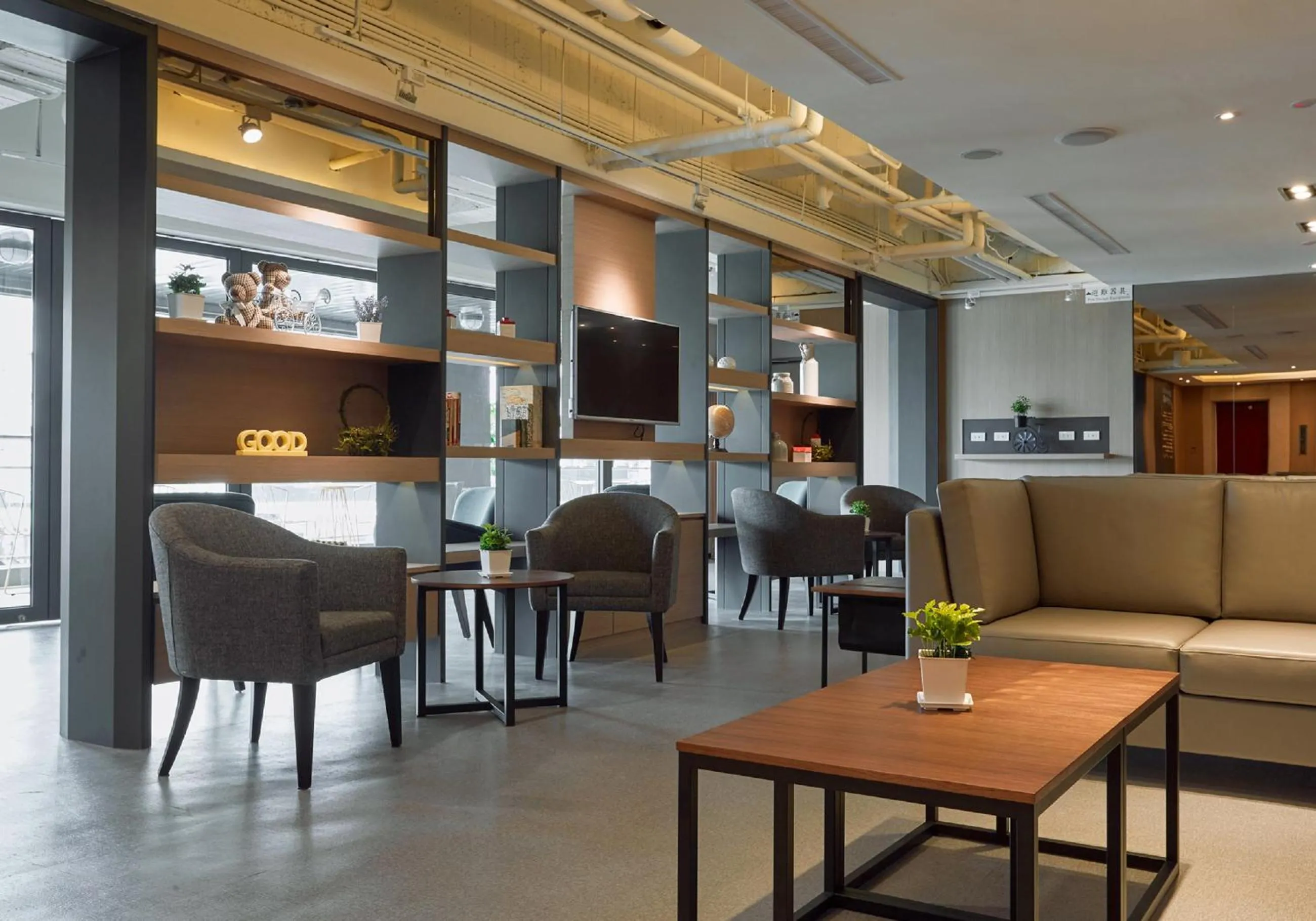 Communal lounge/ TV room in Orange Hotel - Wenhua, Chiayi