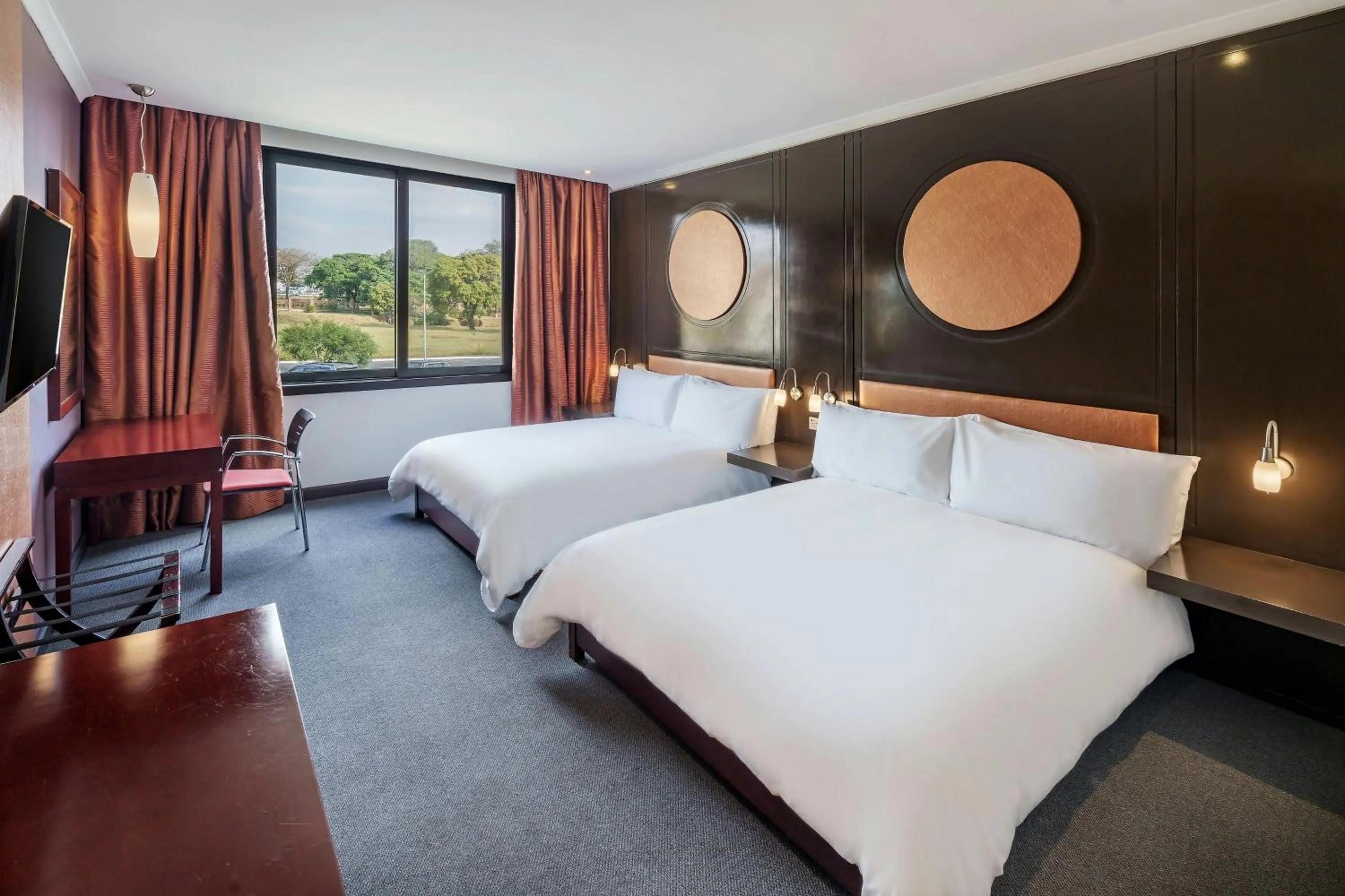 Photo of the whole room, Bed in Protea Hotel by Marriott Ndola