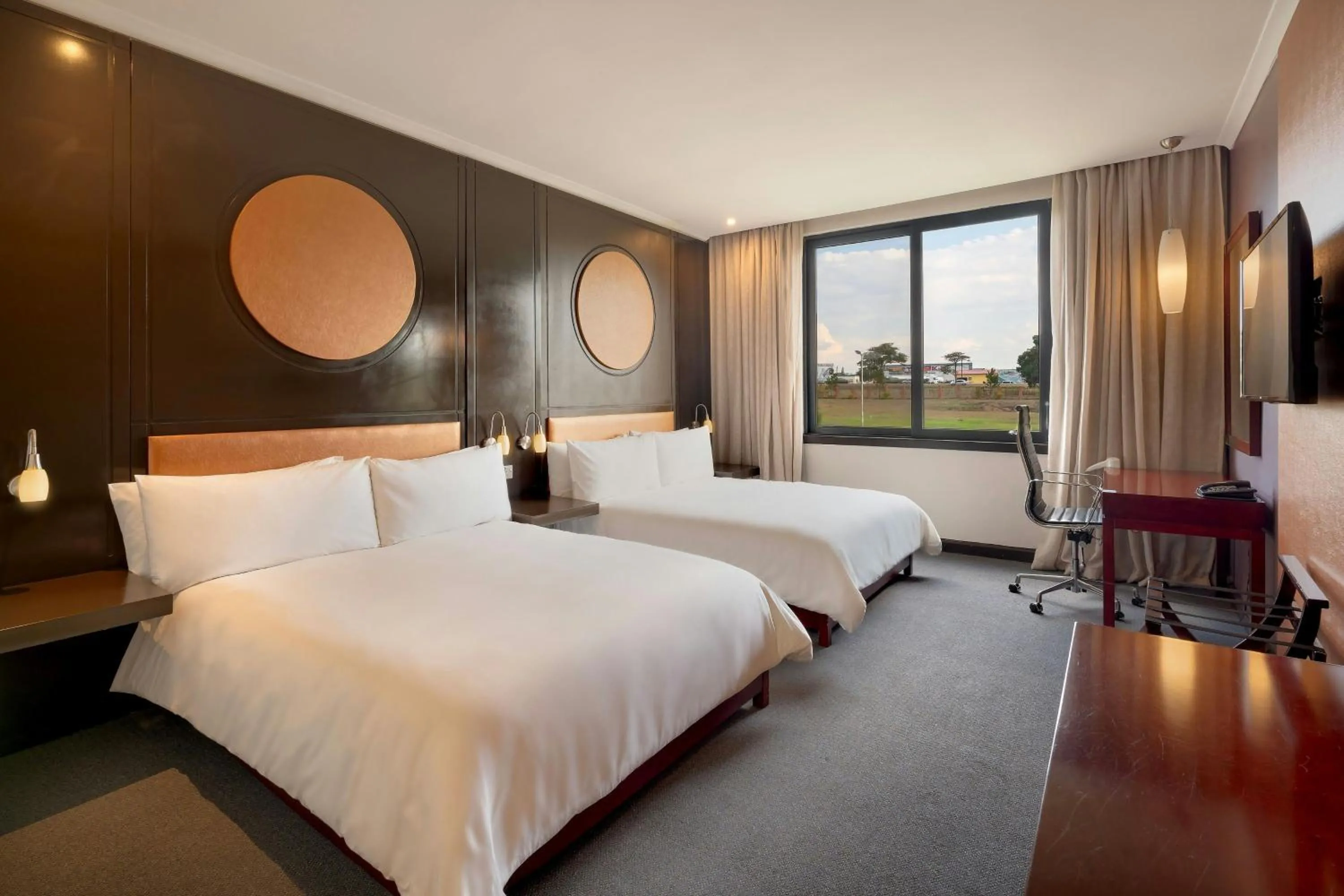 Photo of the whole room, Bed in Protea Hotel by Marriott Ndola