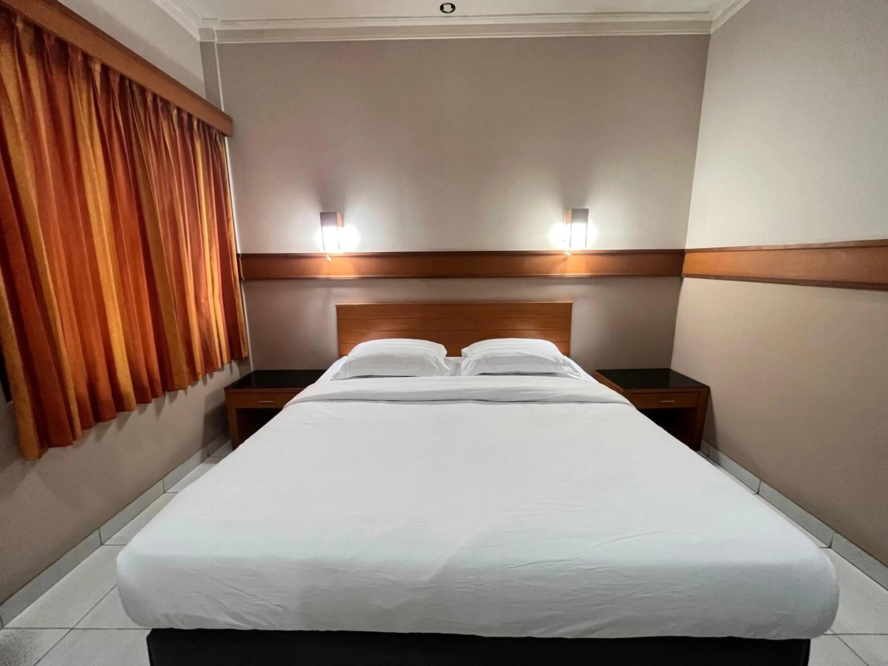 Bed in Hotel Caravan Tanah Abang