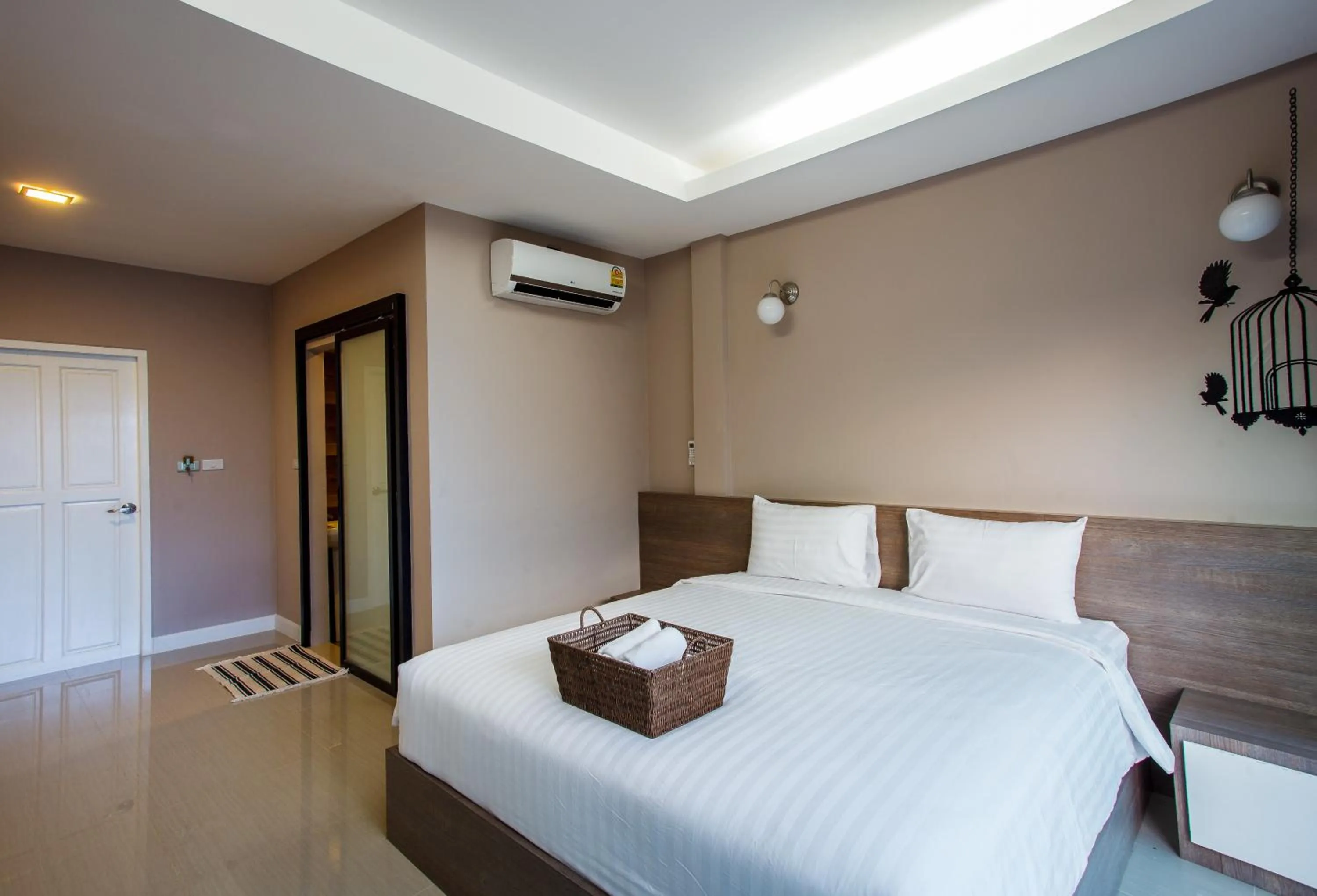 Bed in Sata House Boutique Resort