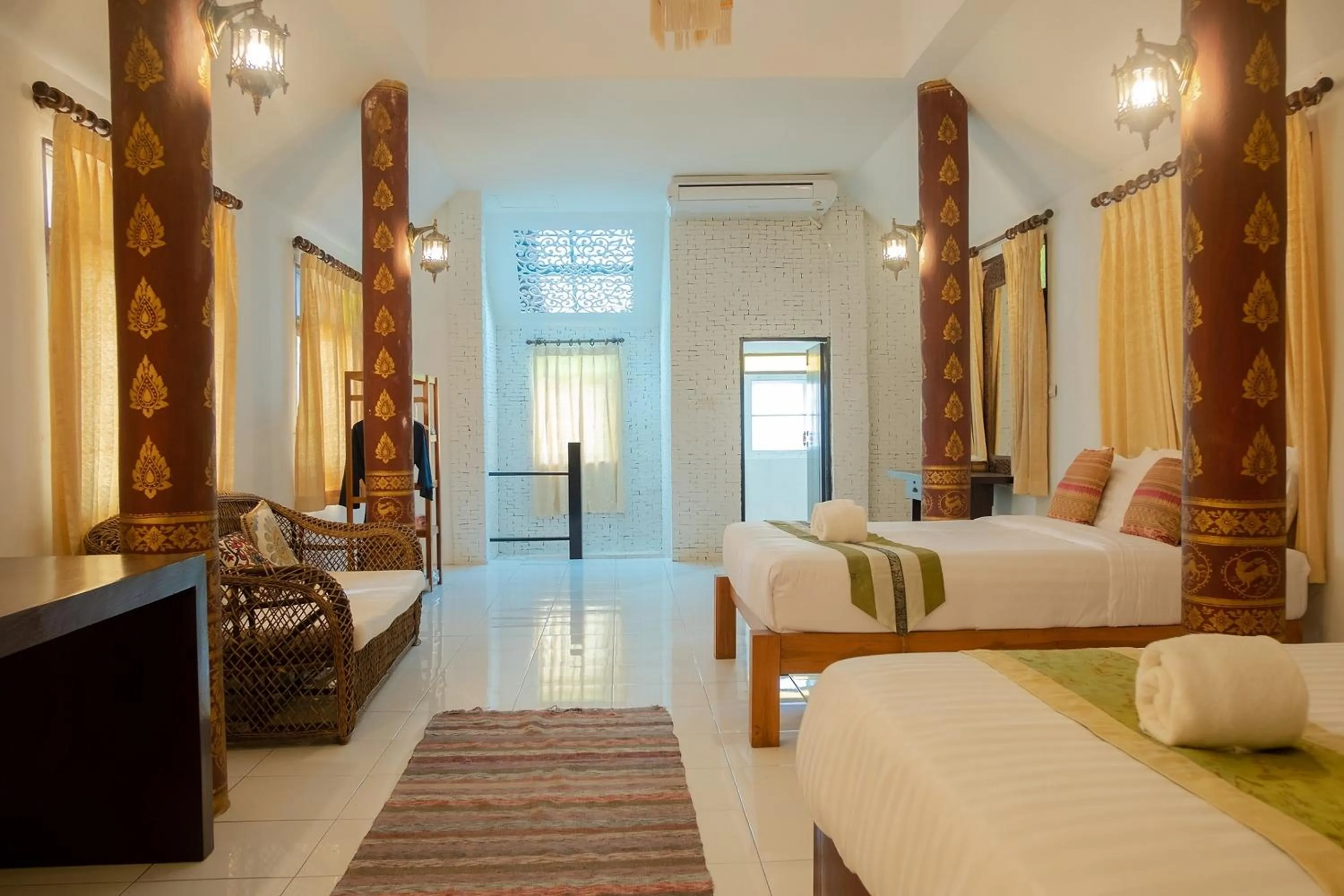 Bed in Baan Tawai Lanna Resort