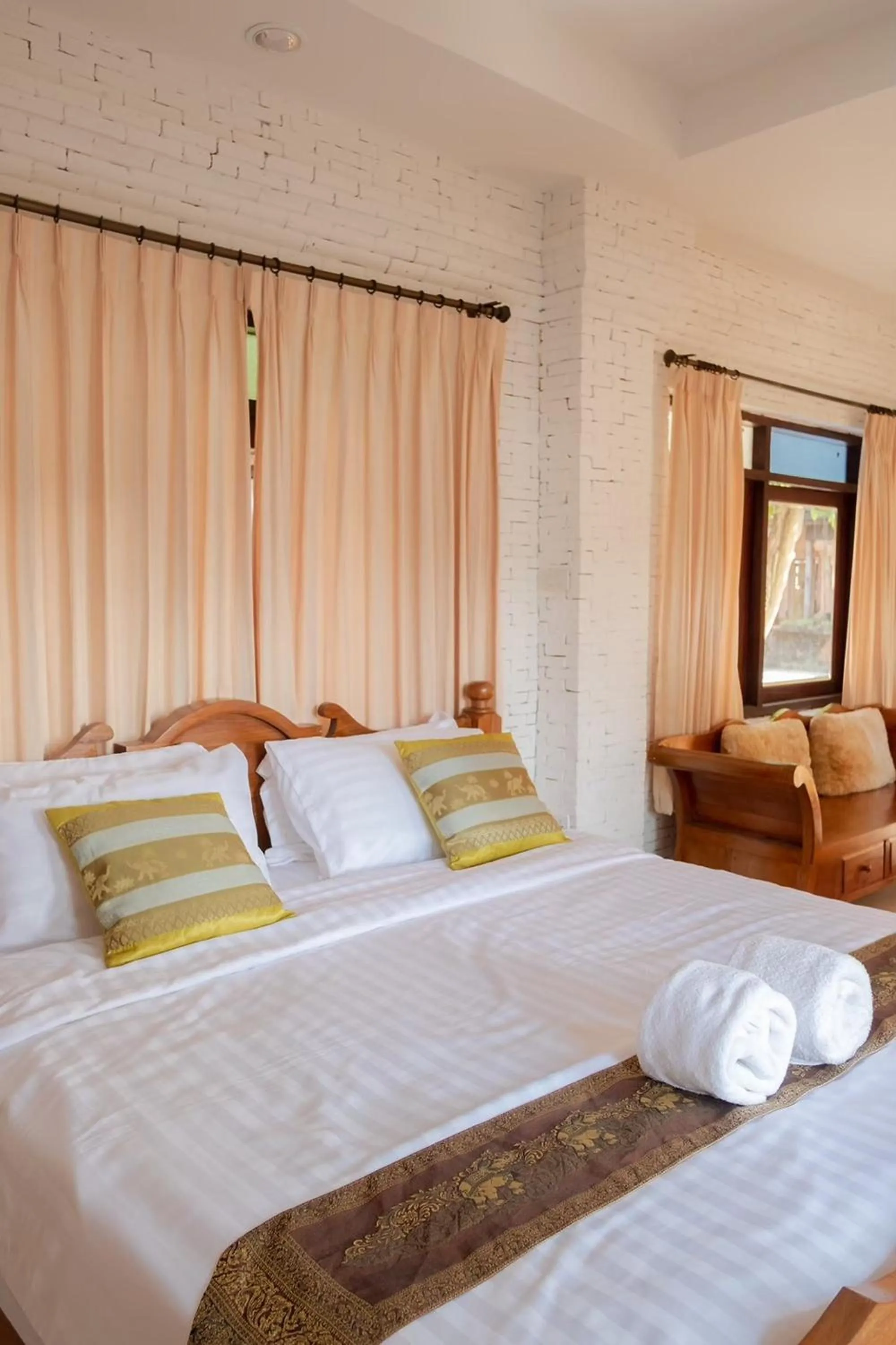 Bed in Baan Tawai Lanna Resort