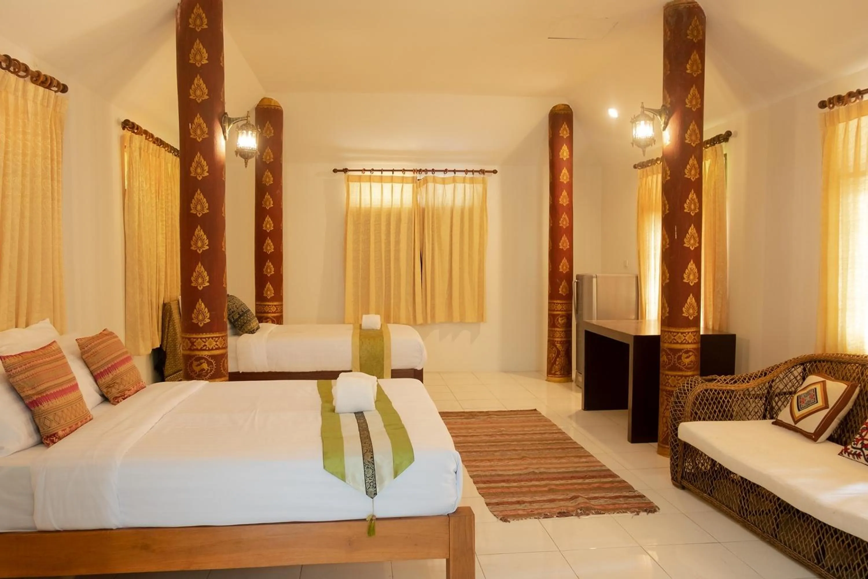 Bed in Baan Tawai Lanna Resort
