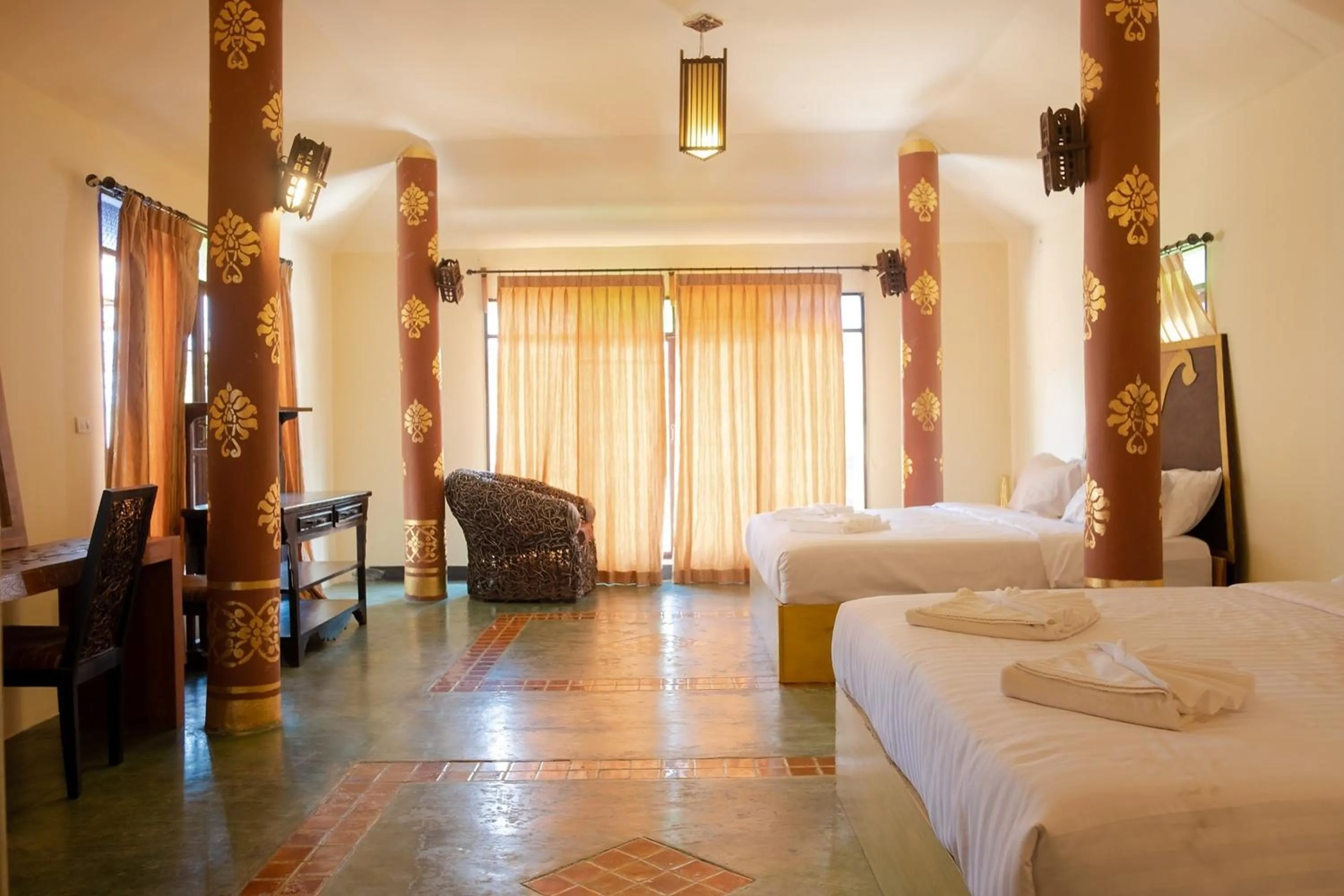 Bed in Baan Tawai Lanna Resort