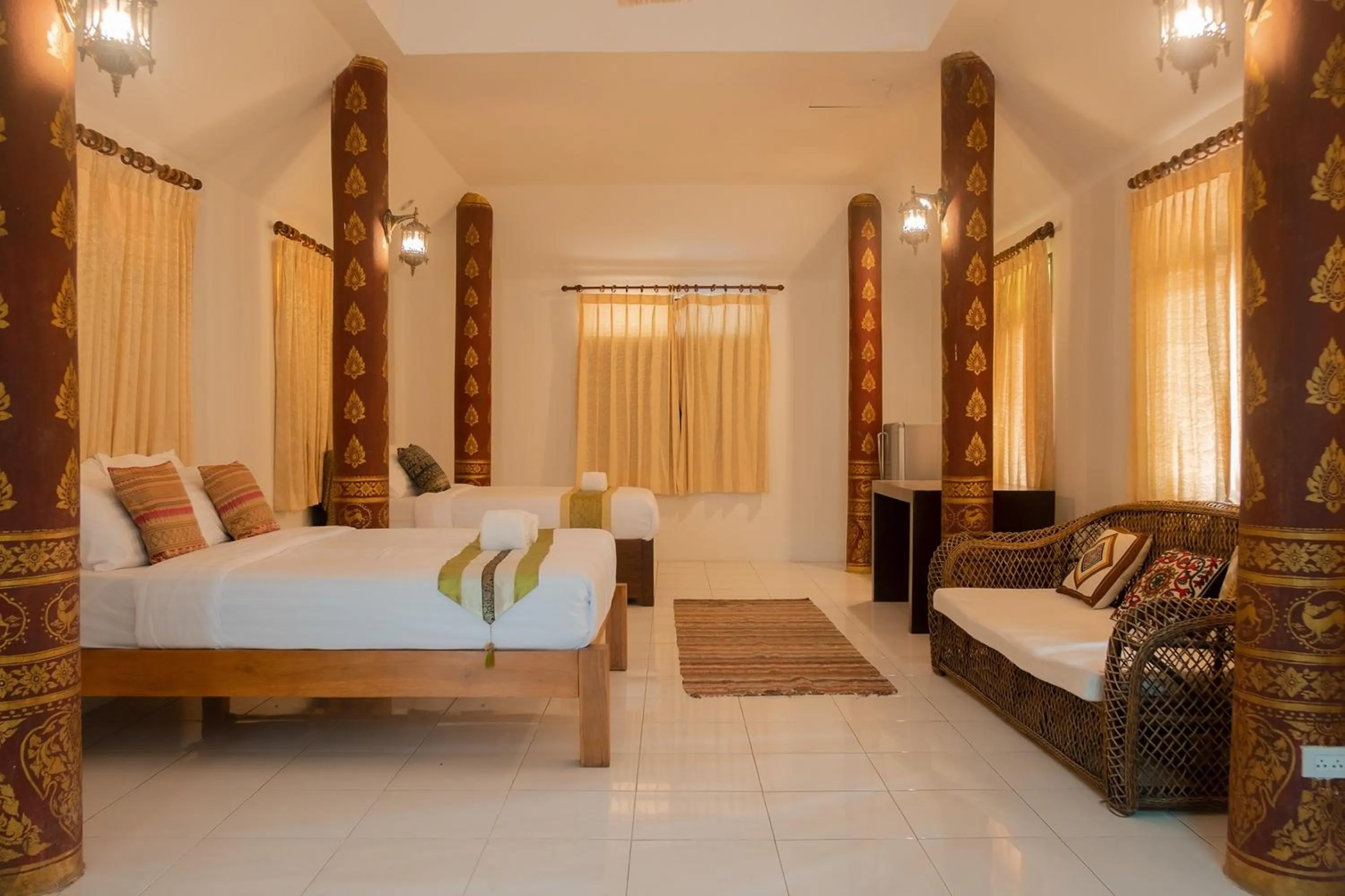 Bed in Baan Tawai Lanna Resort